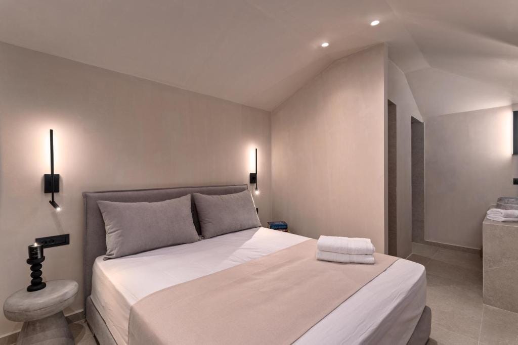 a bed with white sheets