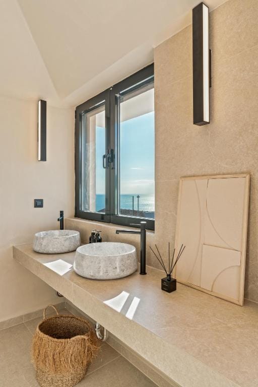 a bathroom with a large mirror