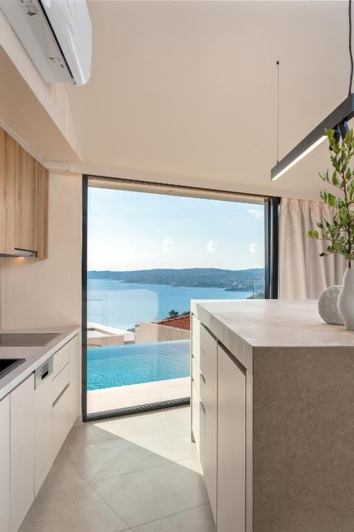 a kitchen with a large window