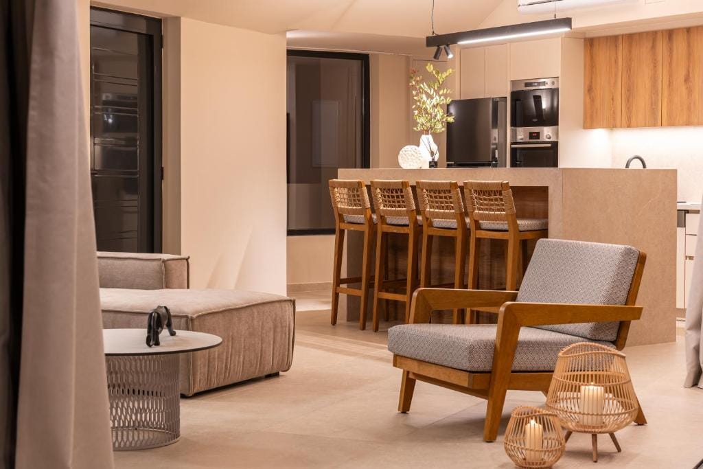 a kitchen with a dining table and chairs