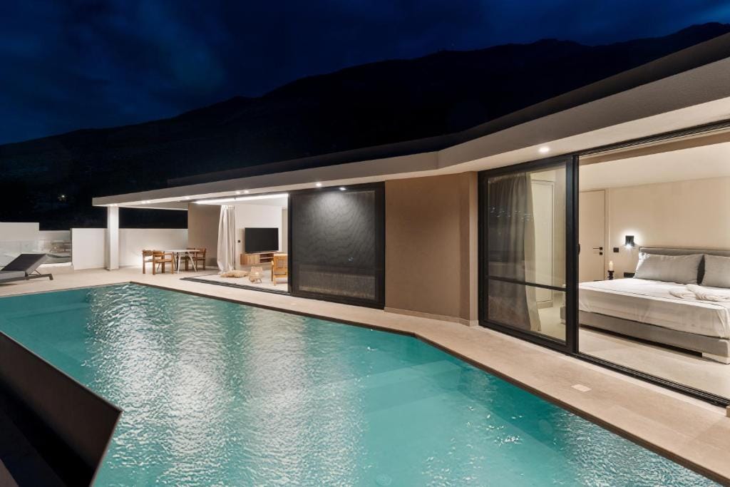 a swimming pool with a large screen