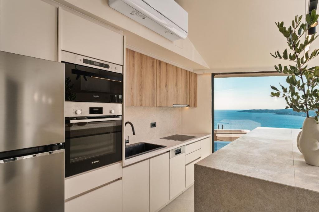 a kitchen with white cabinets