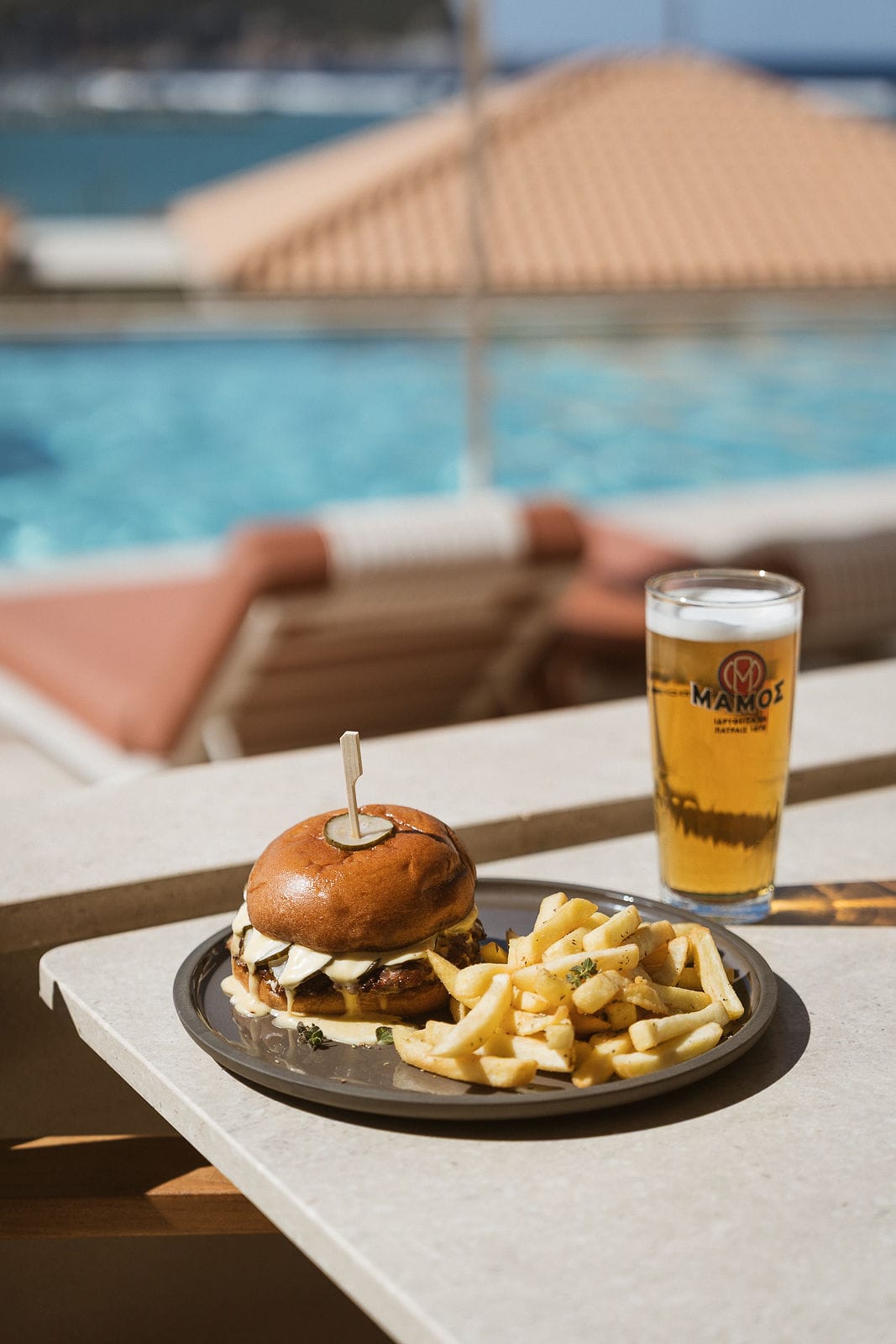 a burger and fries on a table