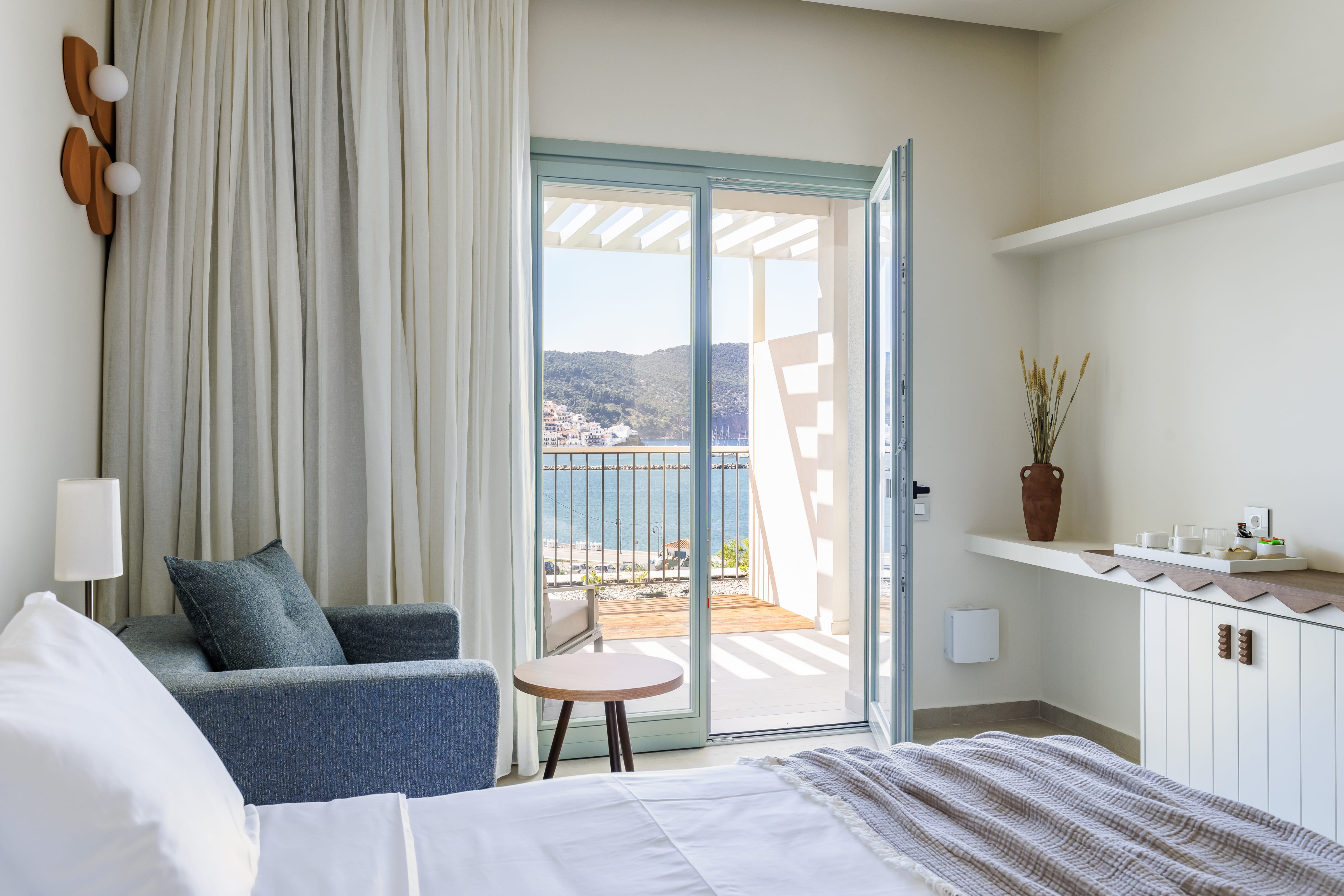 a bedroom with a large window