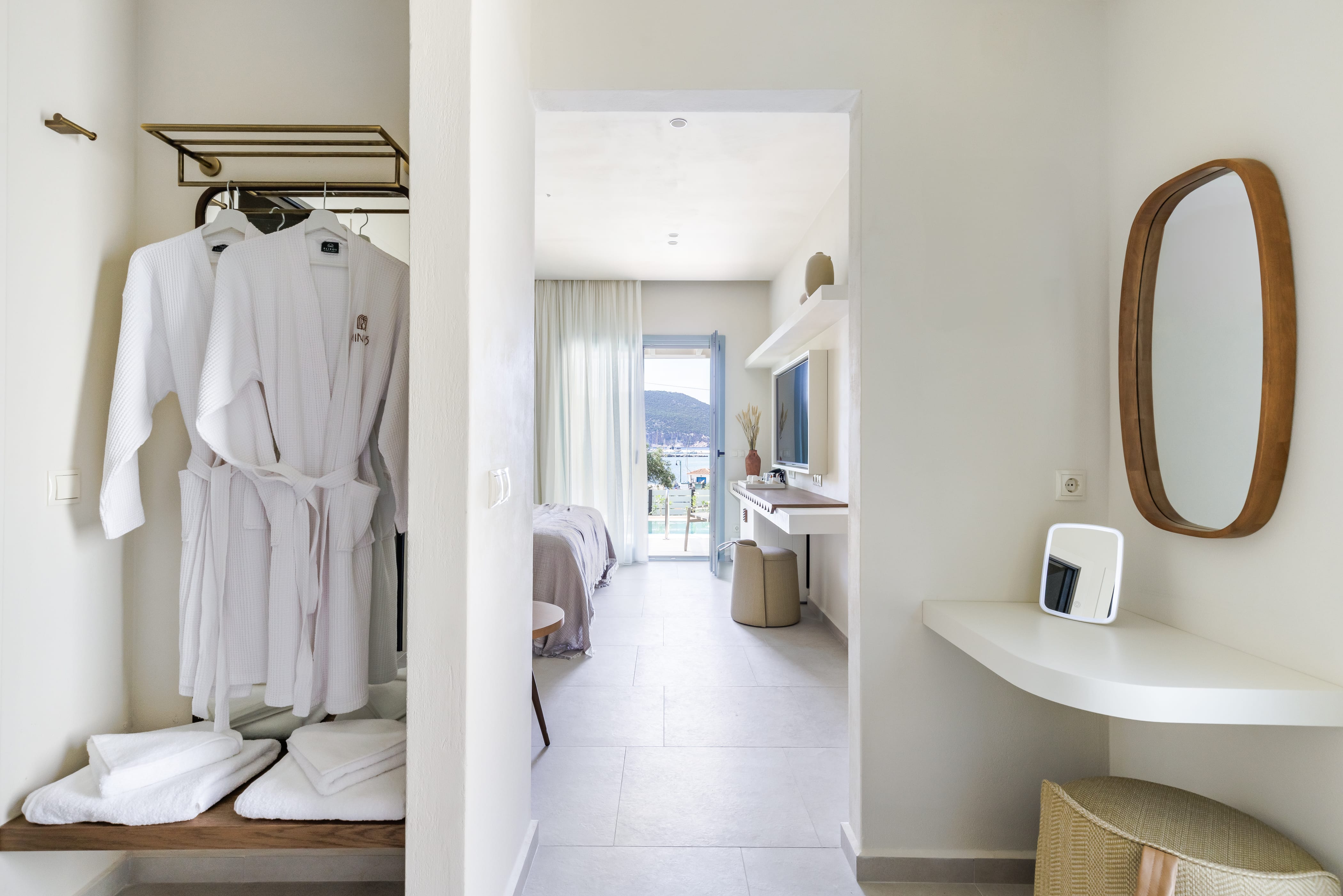 a bathroom with a mirror and a sink