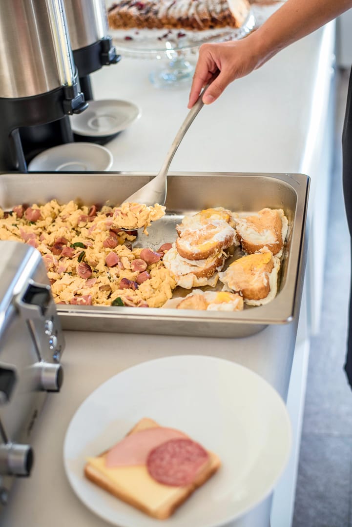 a person cooking food on a stove