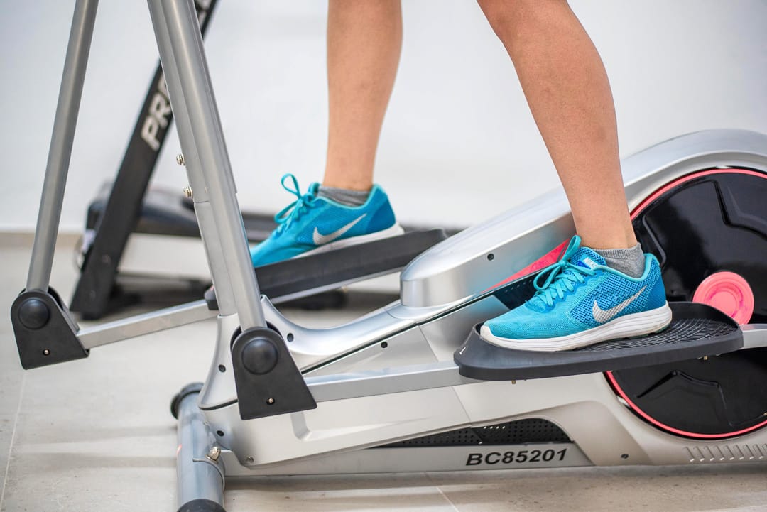 a person's legs on a treadmill