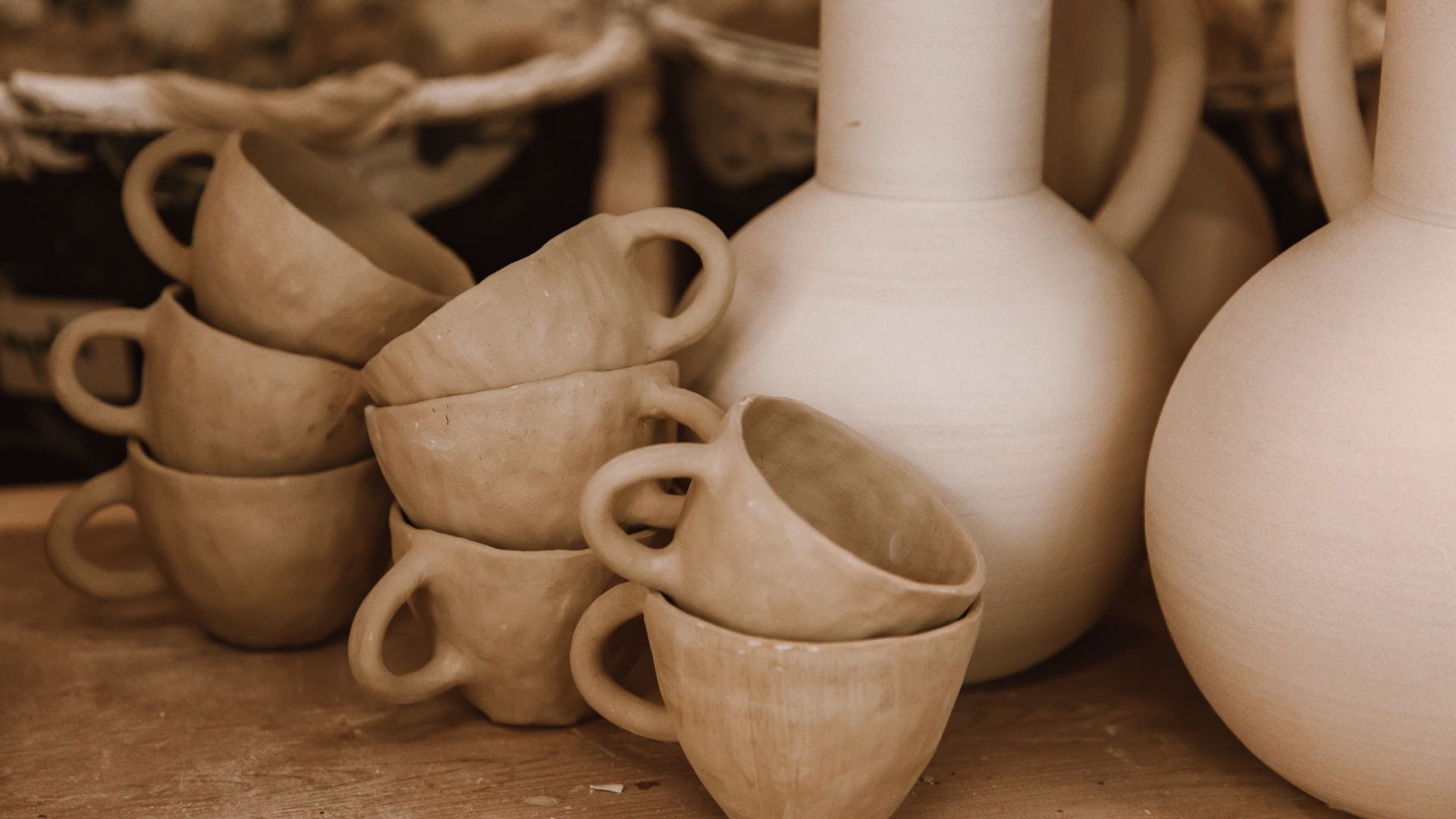 a group of white ceramic pots