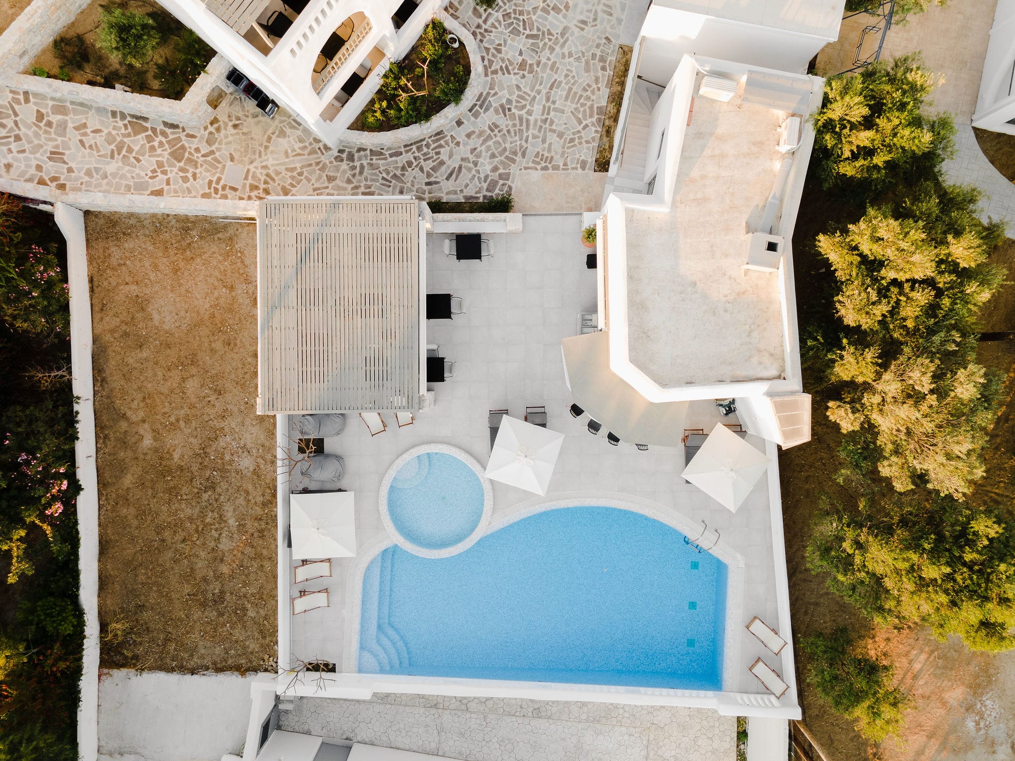 a bathroom with a tub and toilet