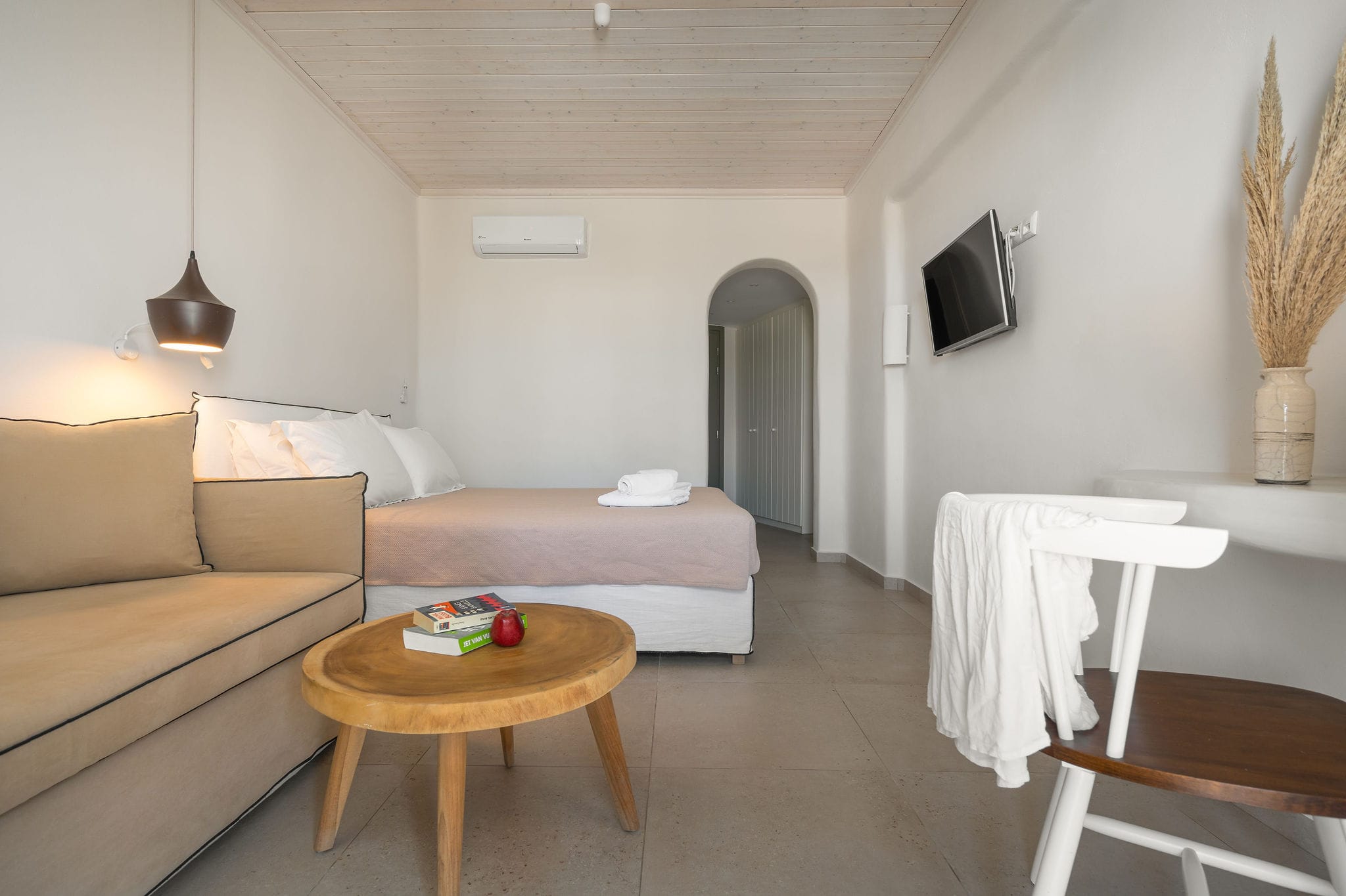 a living room with a couch and a table