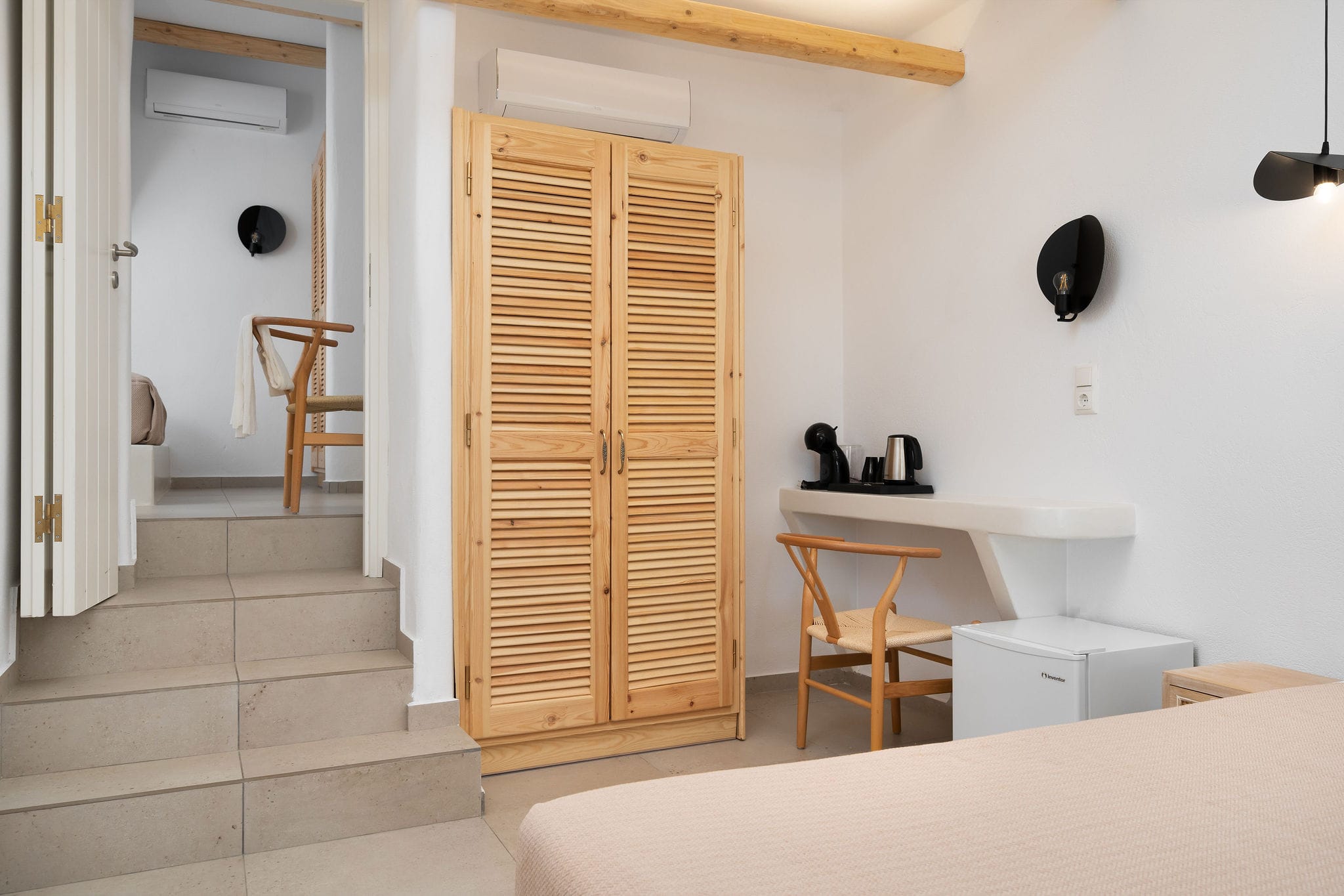 a room with a table and chairs