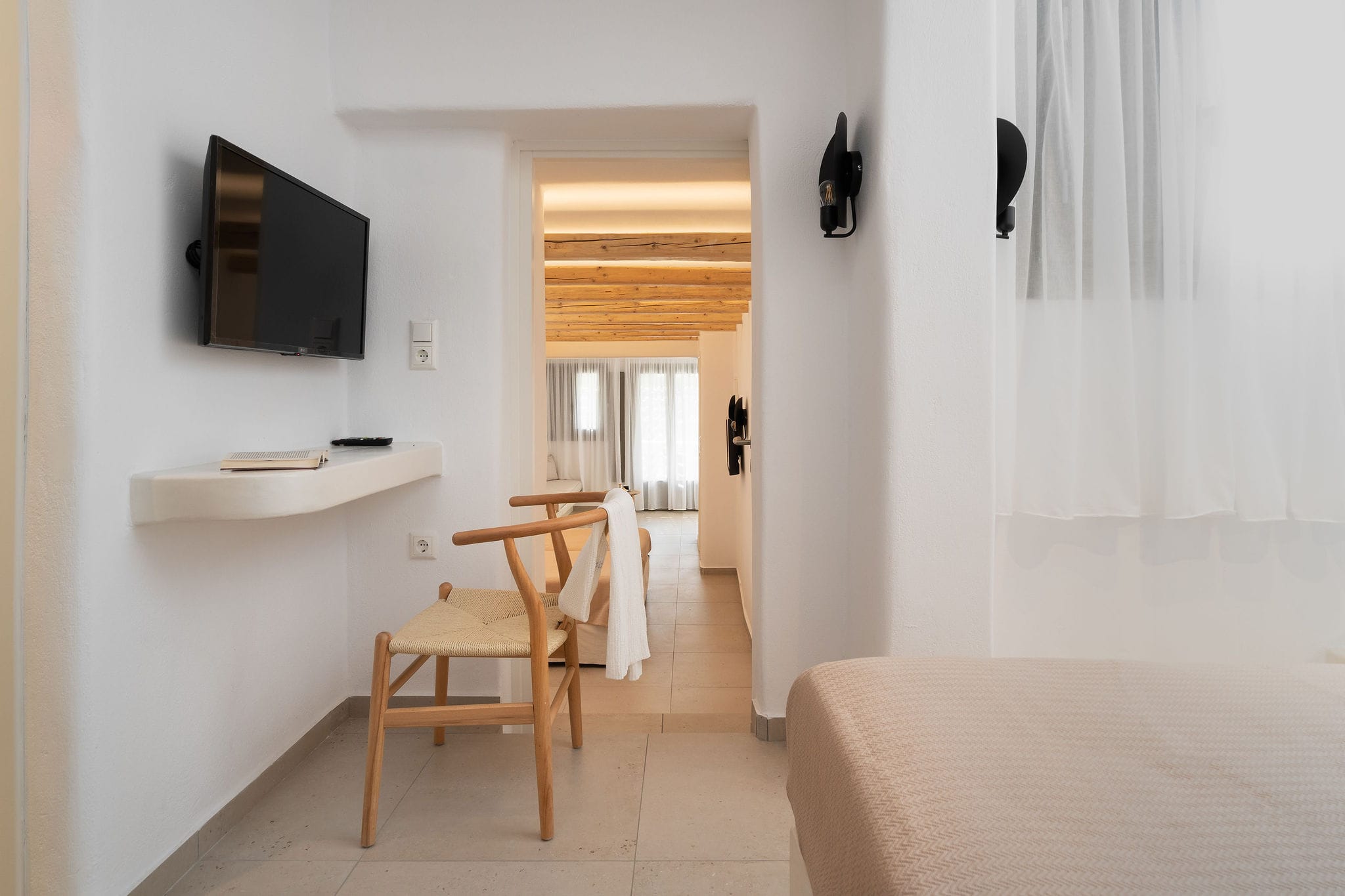 a room with a table and chairs