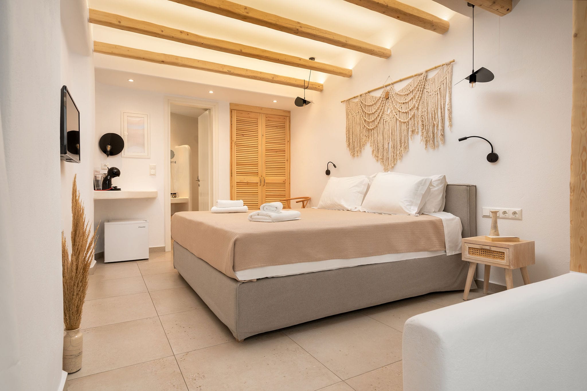 a large bedroom with a large bed