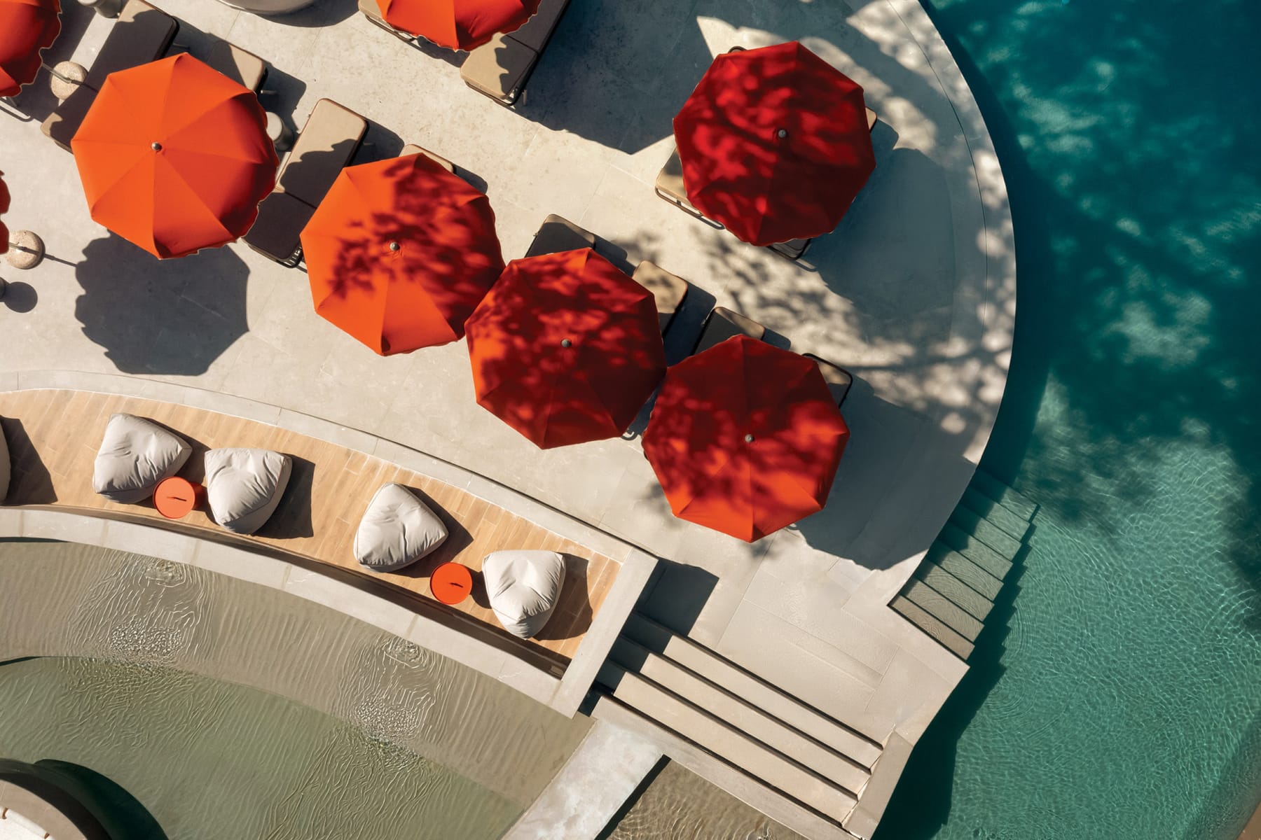 a group of red and white objects on a white and blue surface