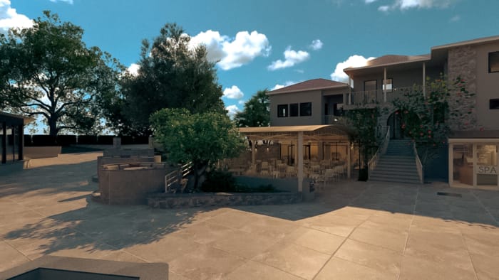 a courtyard with trees and buildings