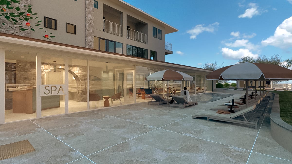 a courtyard with a building in the background