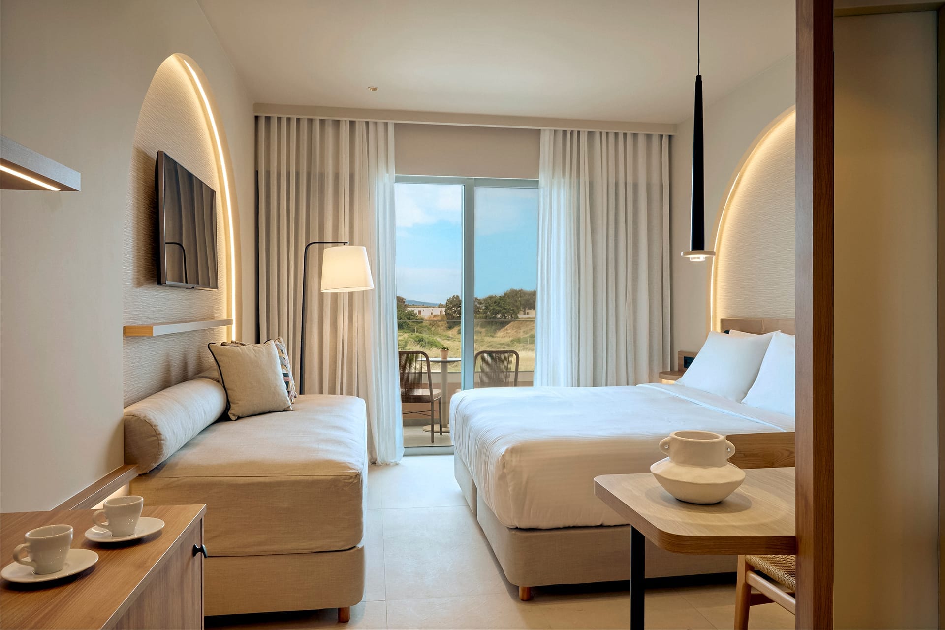 a bedroom with a large window