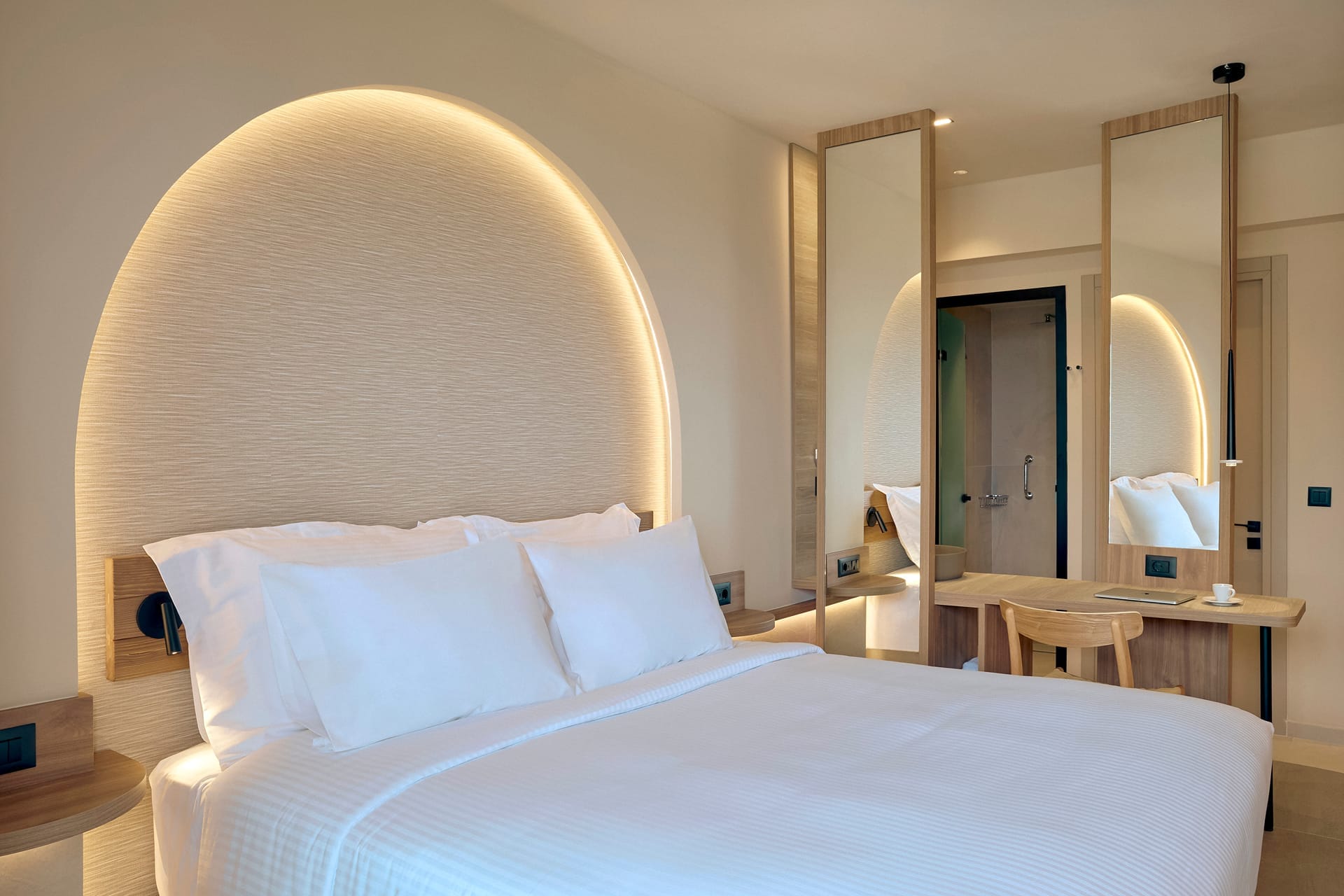 a bed with white sheets