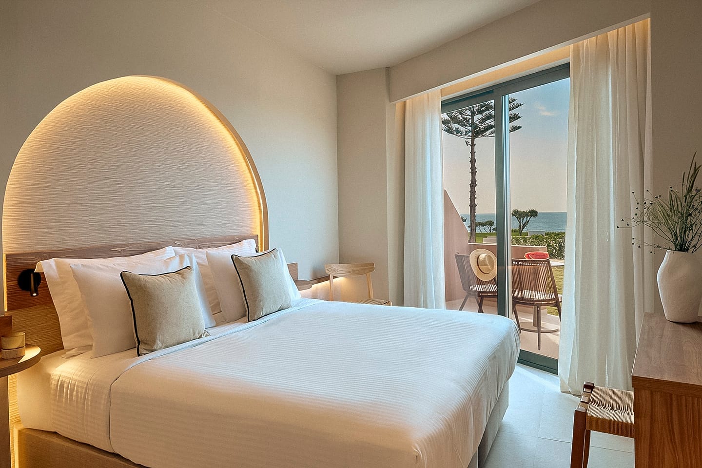 a bed with a large headboard