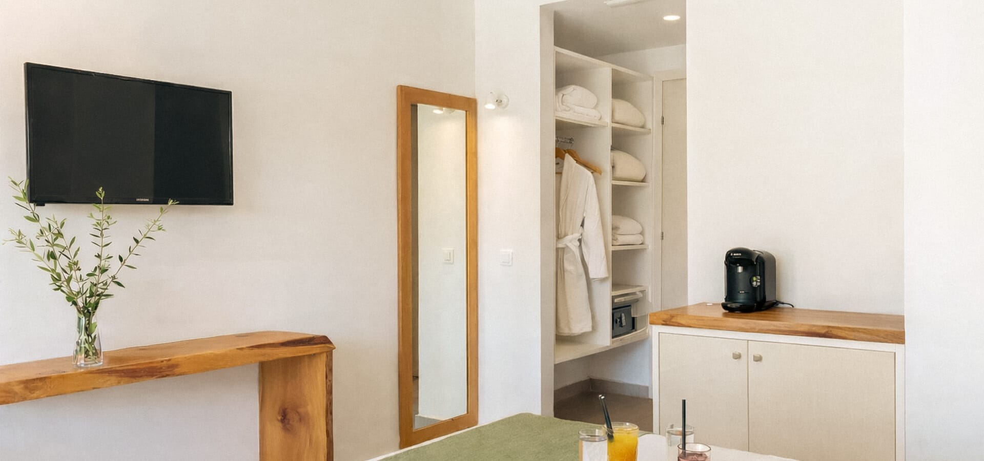 a kitchen with a tv and a table