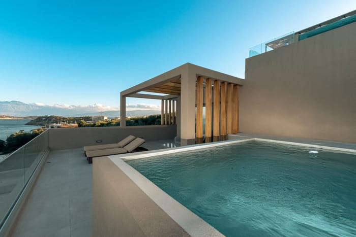 a swimming pool next to a building