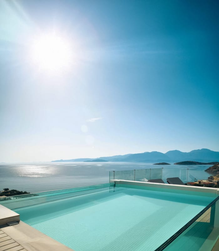a pool with a clear blue sky