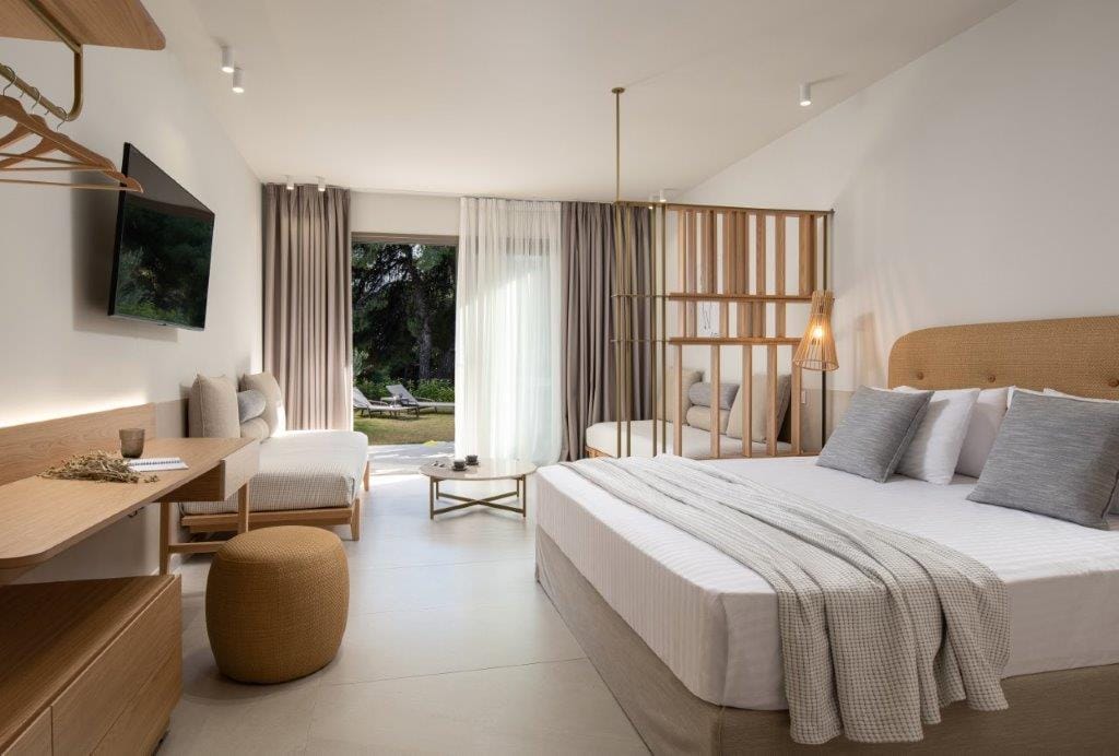 a bedroom with a bed and a desk