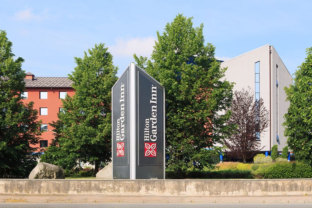 a sign in front of a building