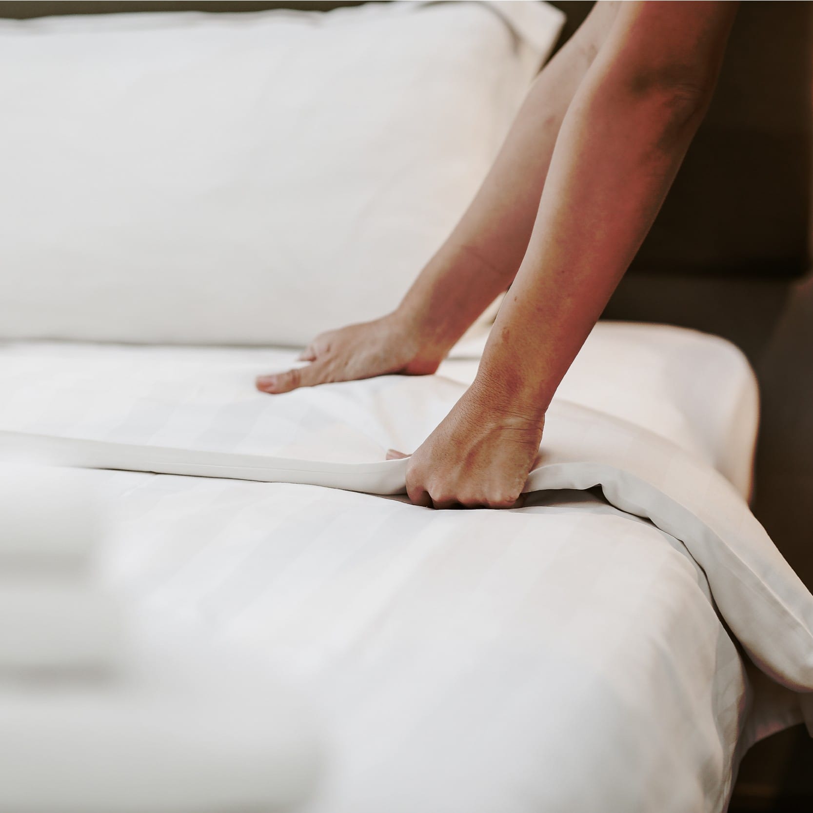 a person's legs on a bed