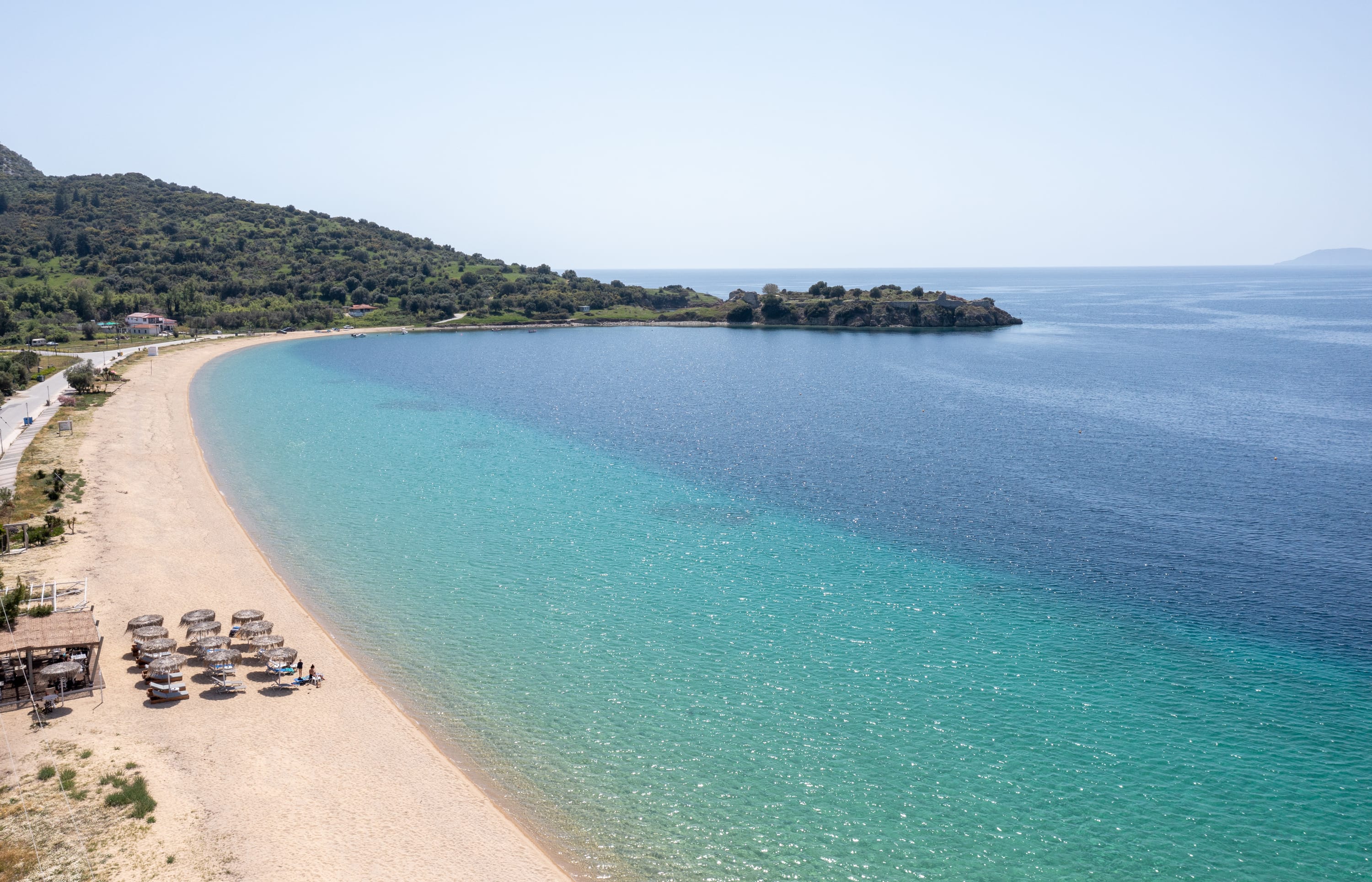 a beach with blue water