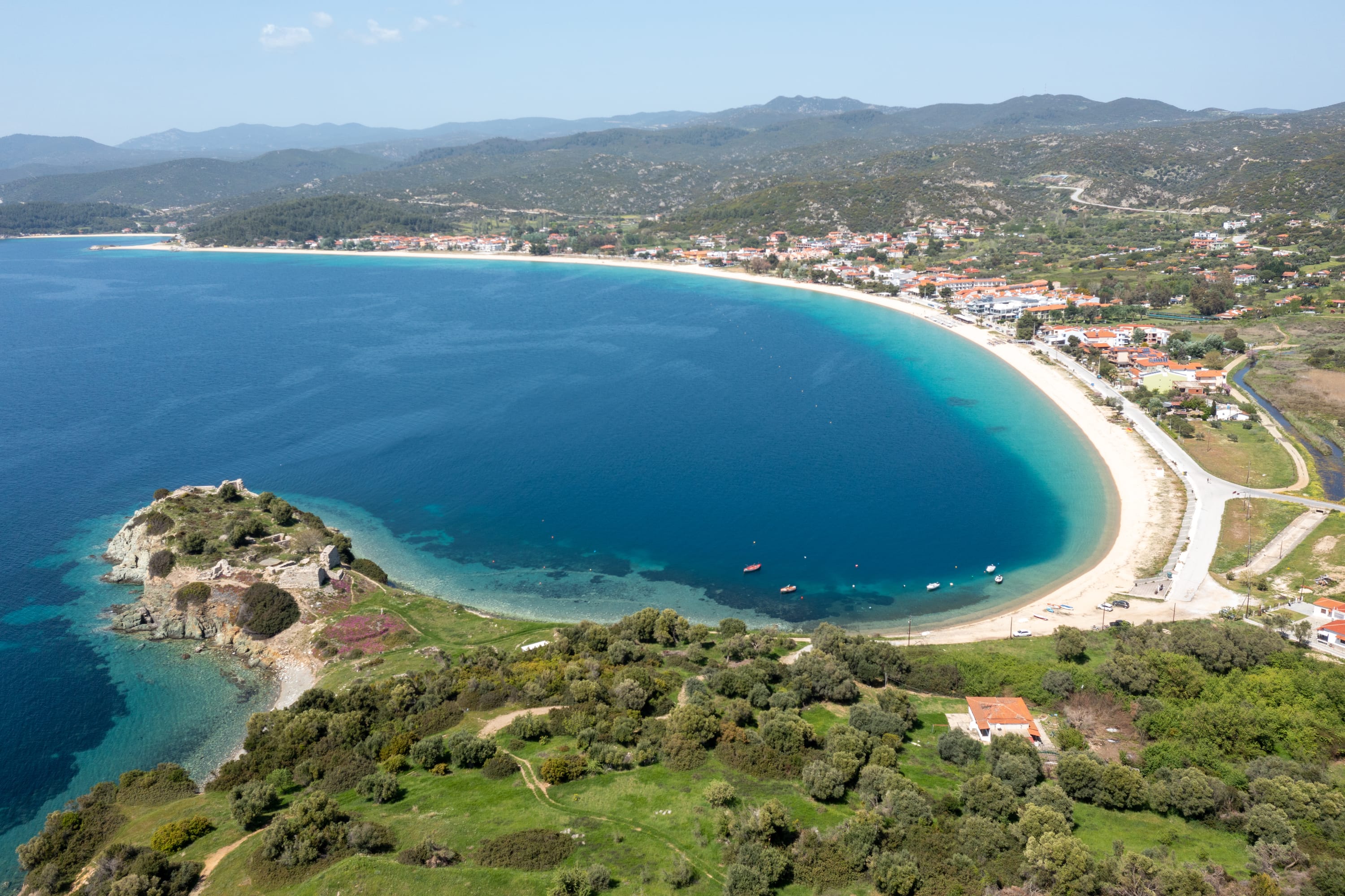 a beach with blue water