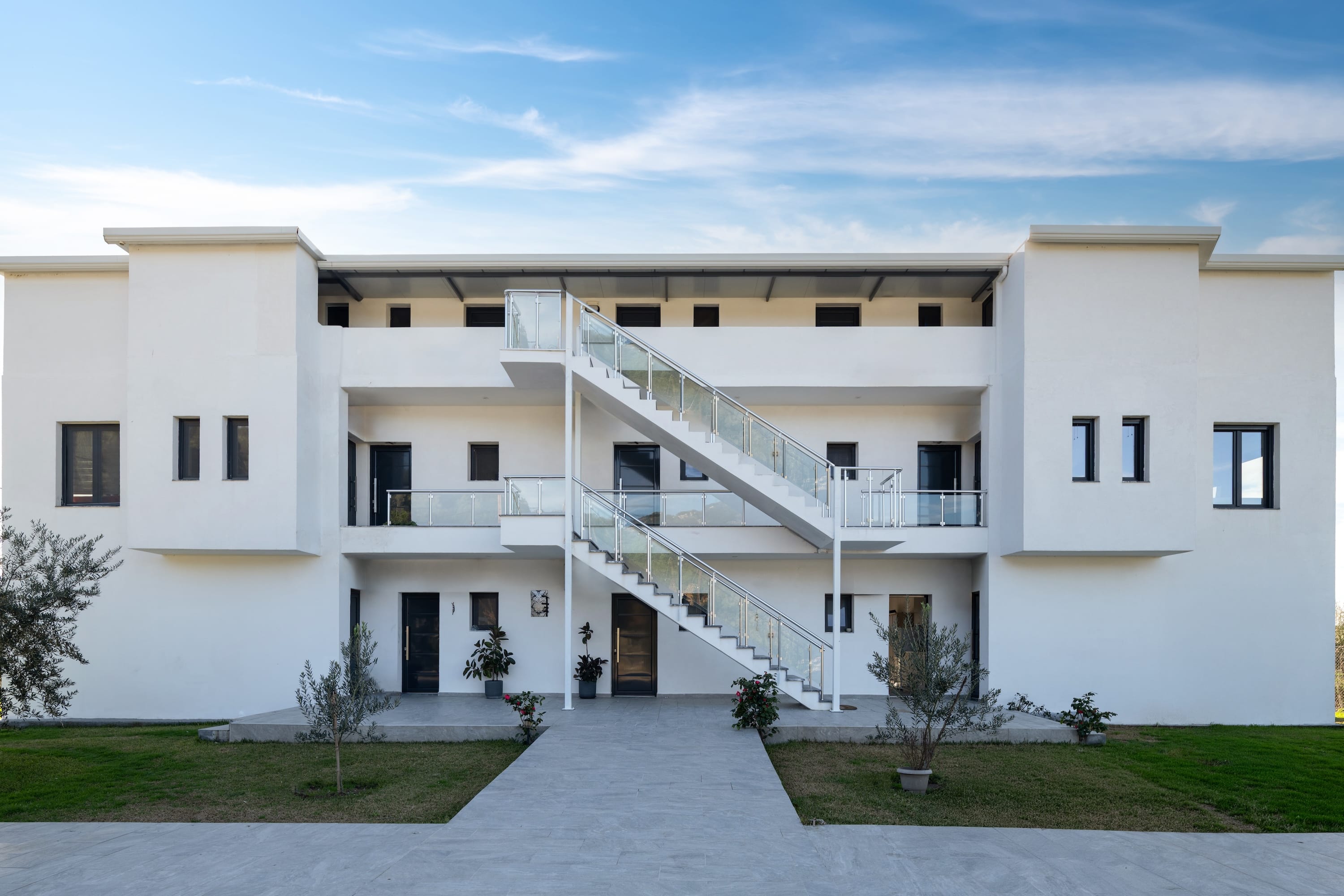 a white building with stairs