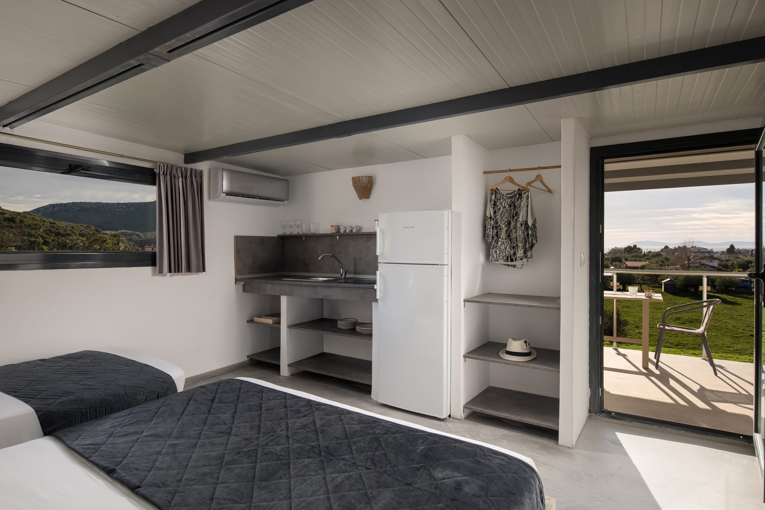 a room with a bed and a window