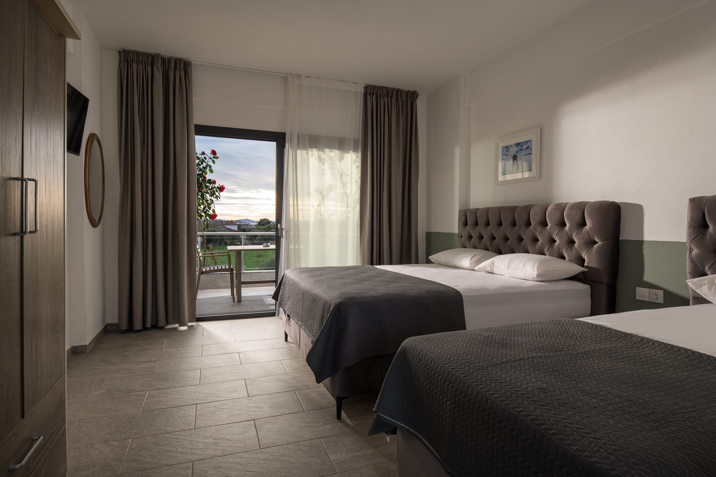 a hotel room with two beds