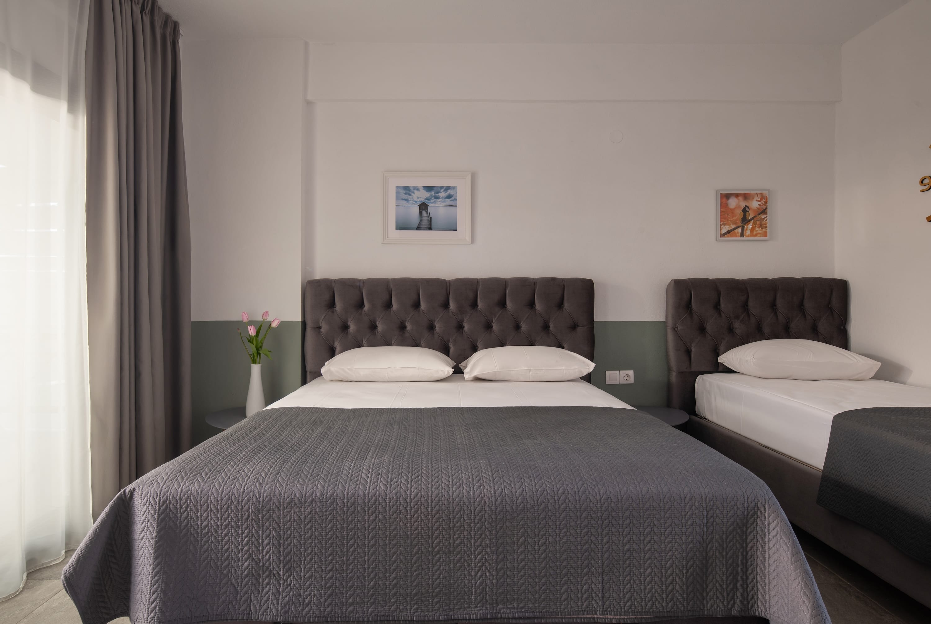 a bed with a black headboard