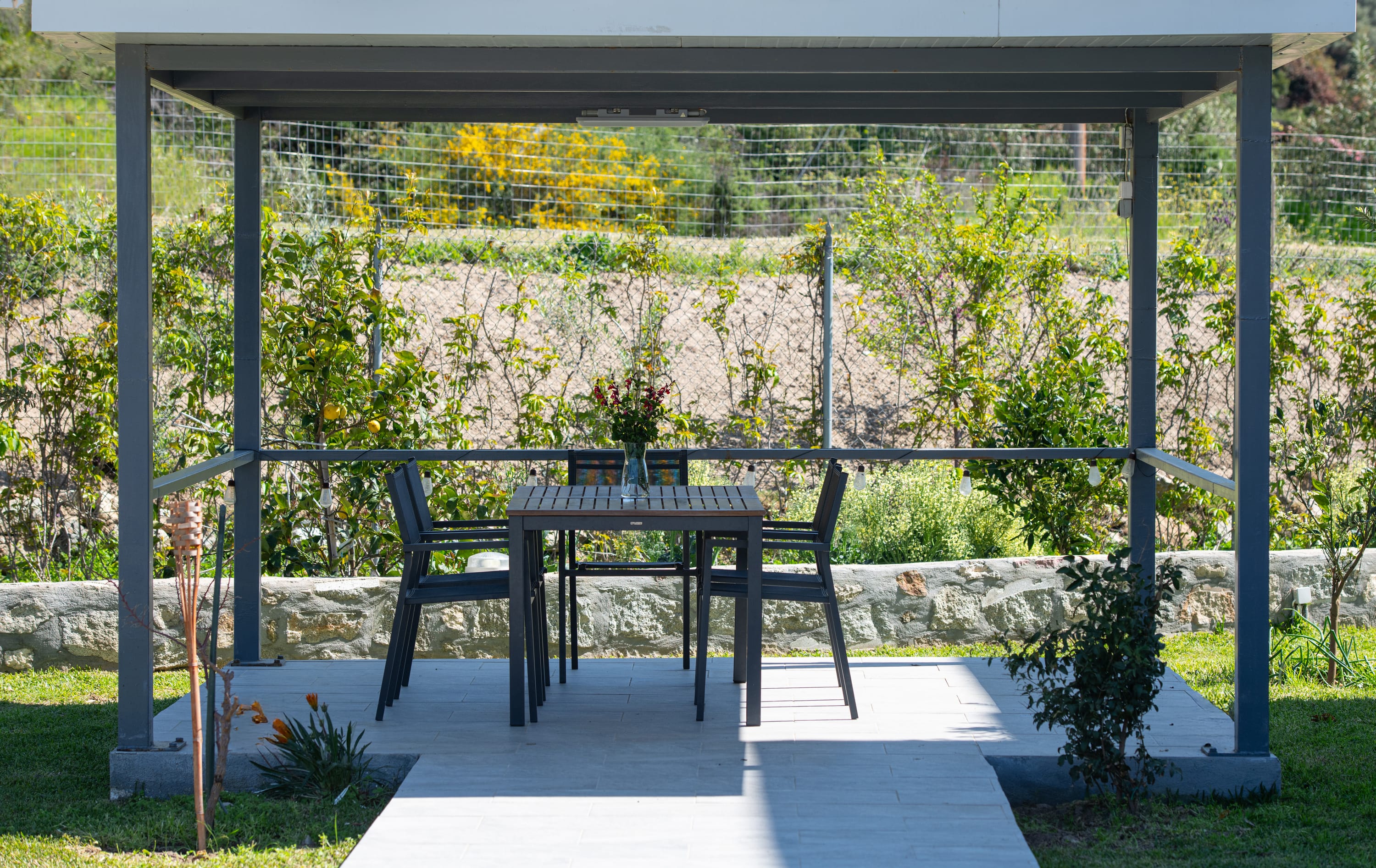 a table and chairs on a patio