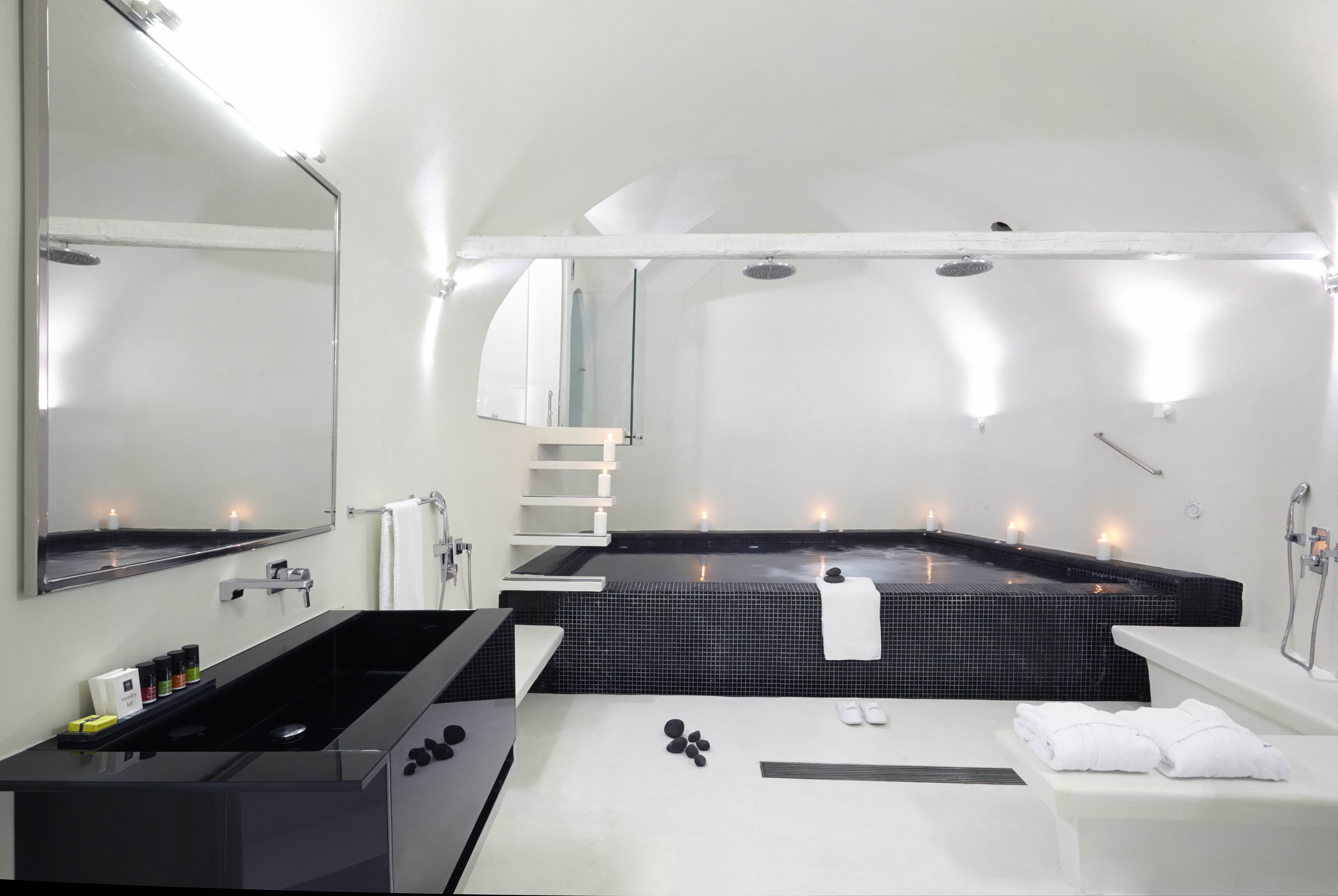 a bathroom with a large mirror