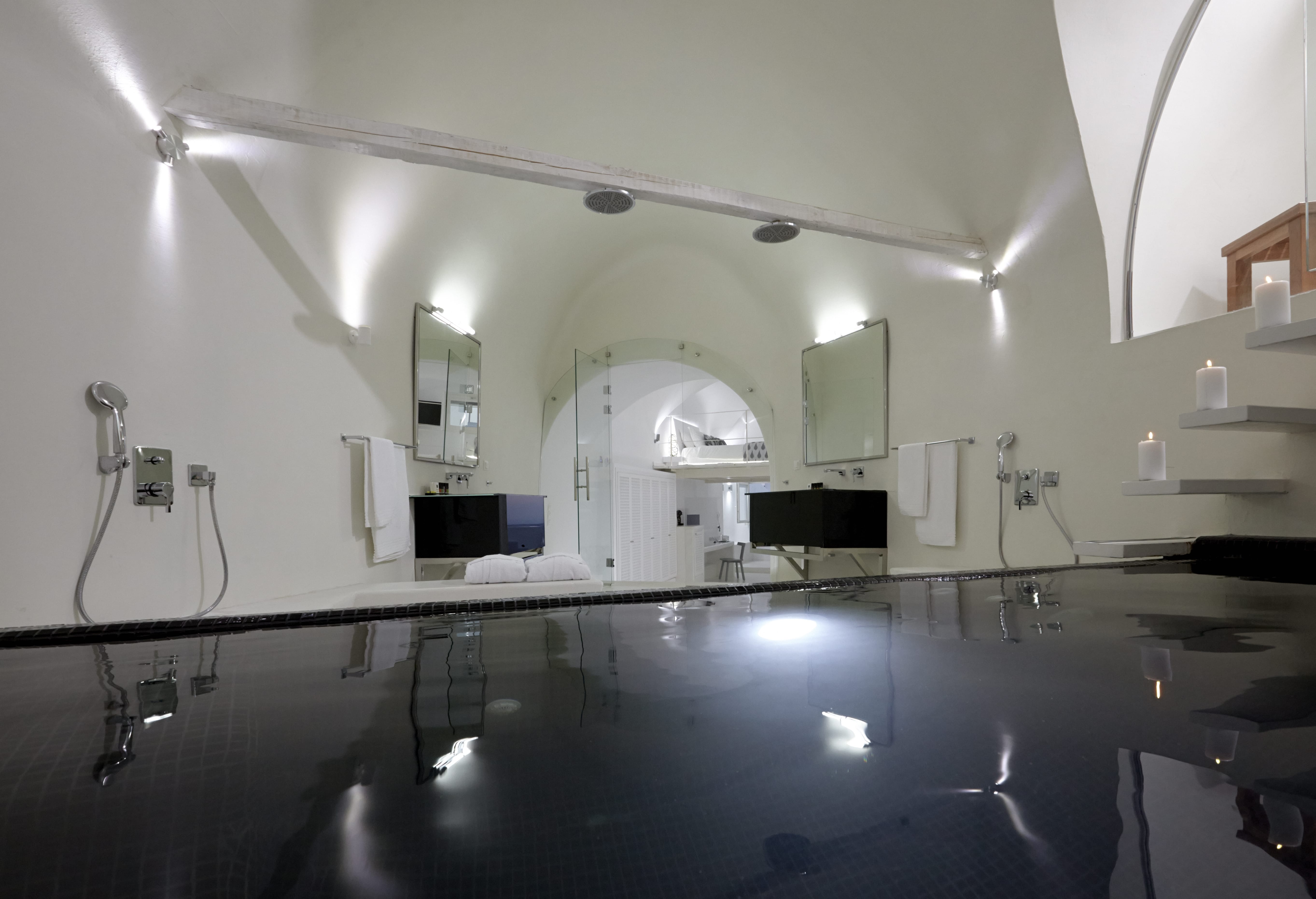 a room with a desk and computer