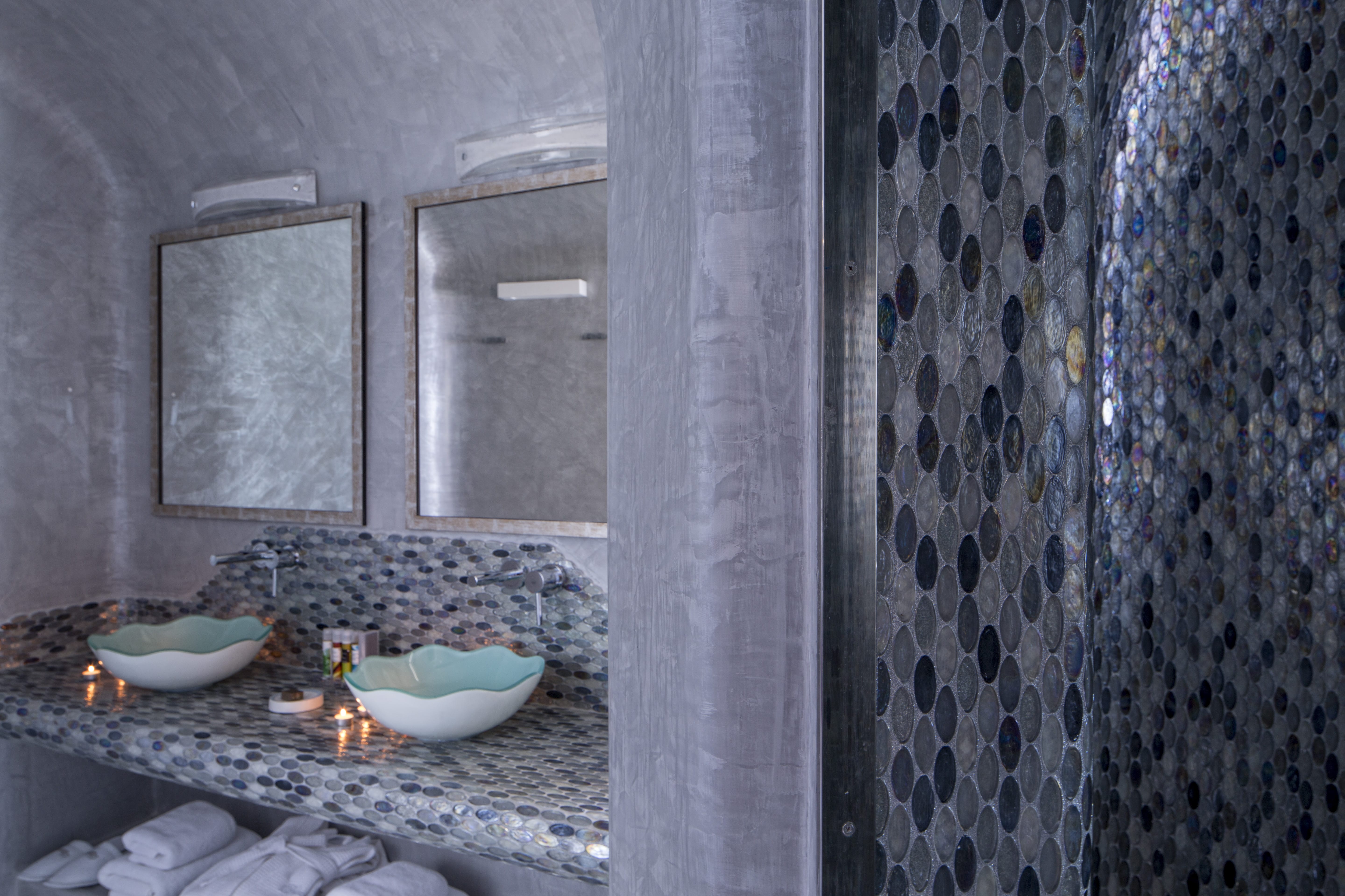 a bathroom with a marble countertop