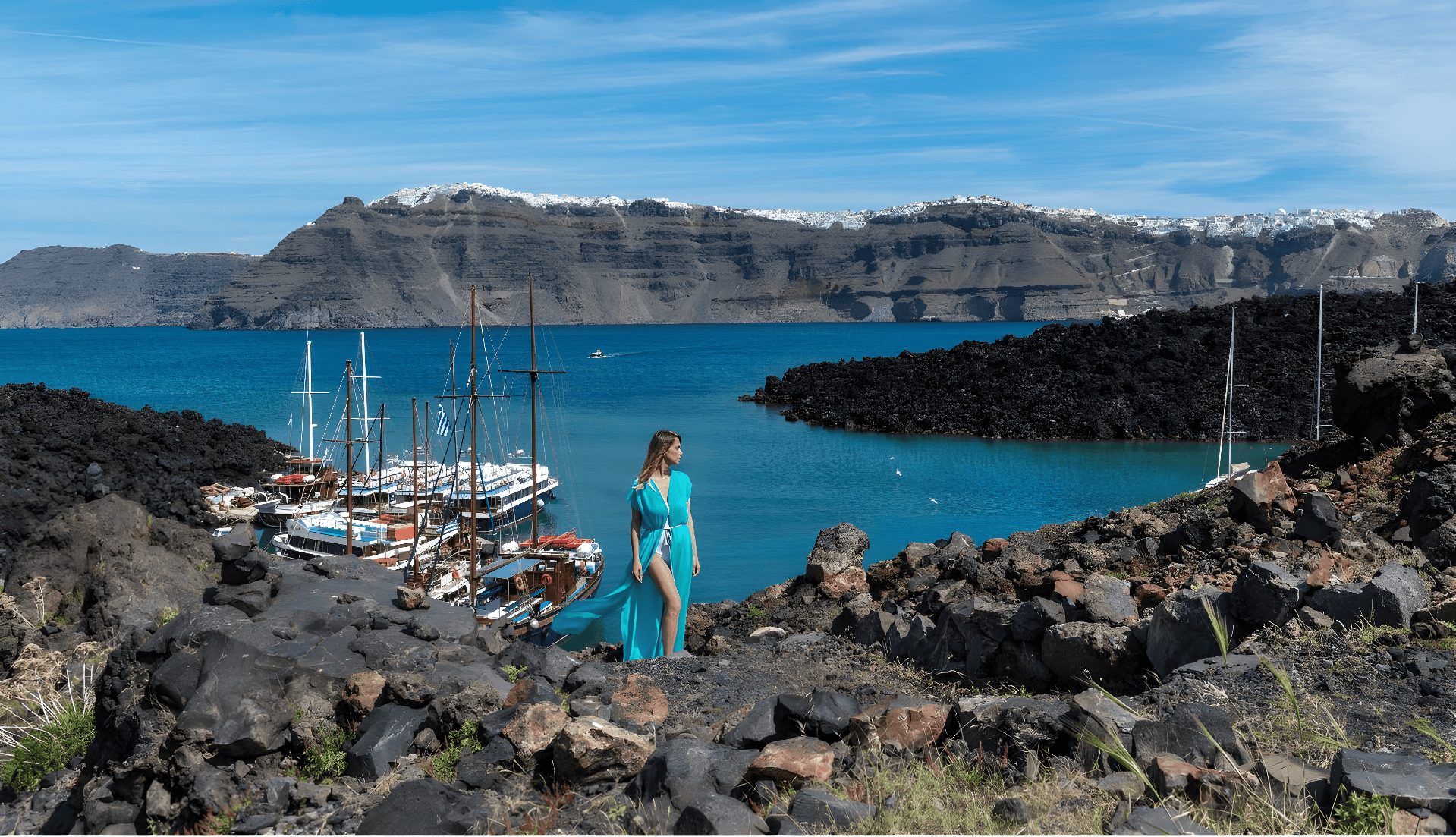 a person standing on a rocky shore