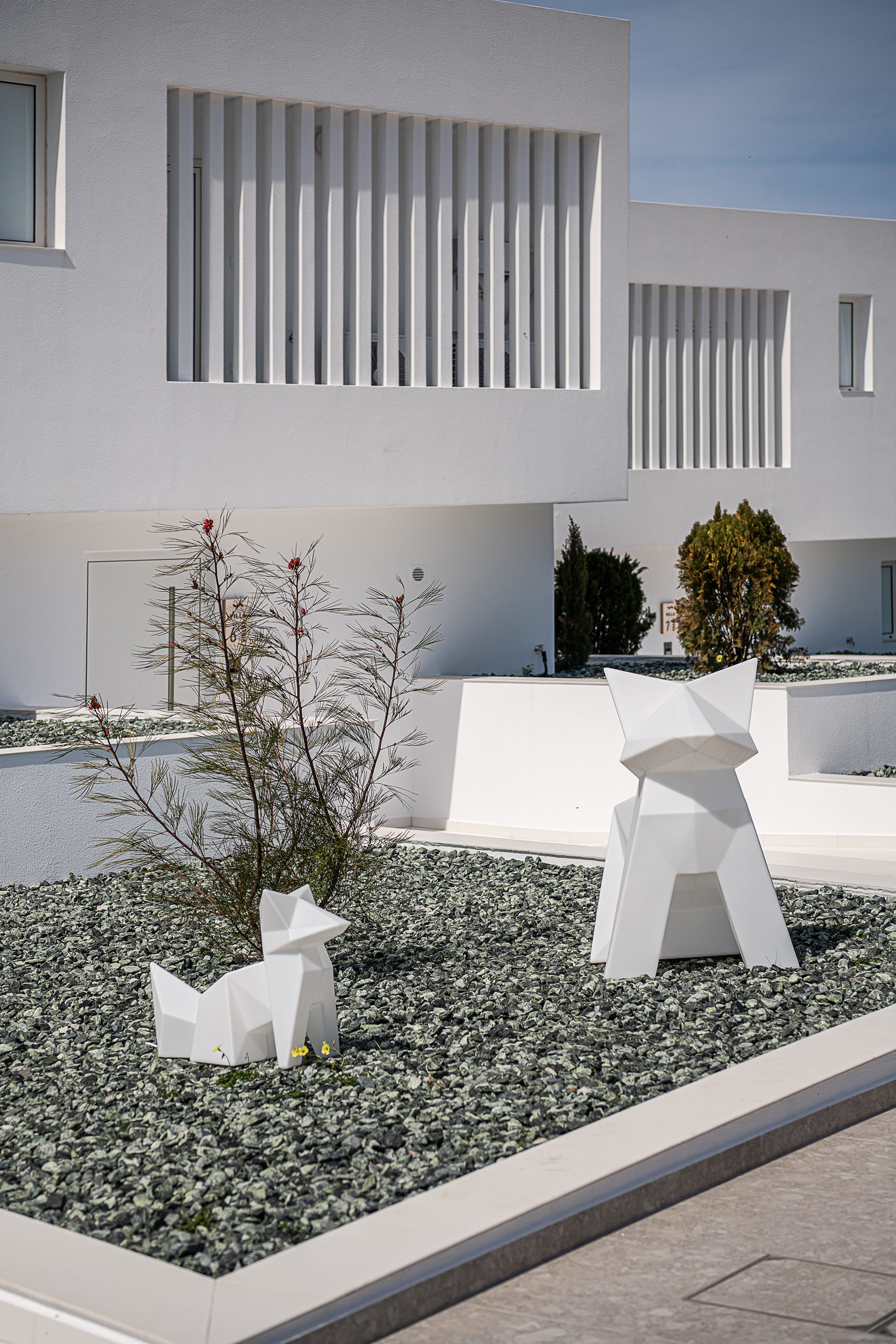a room with white furniture