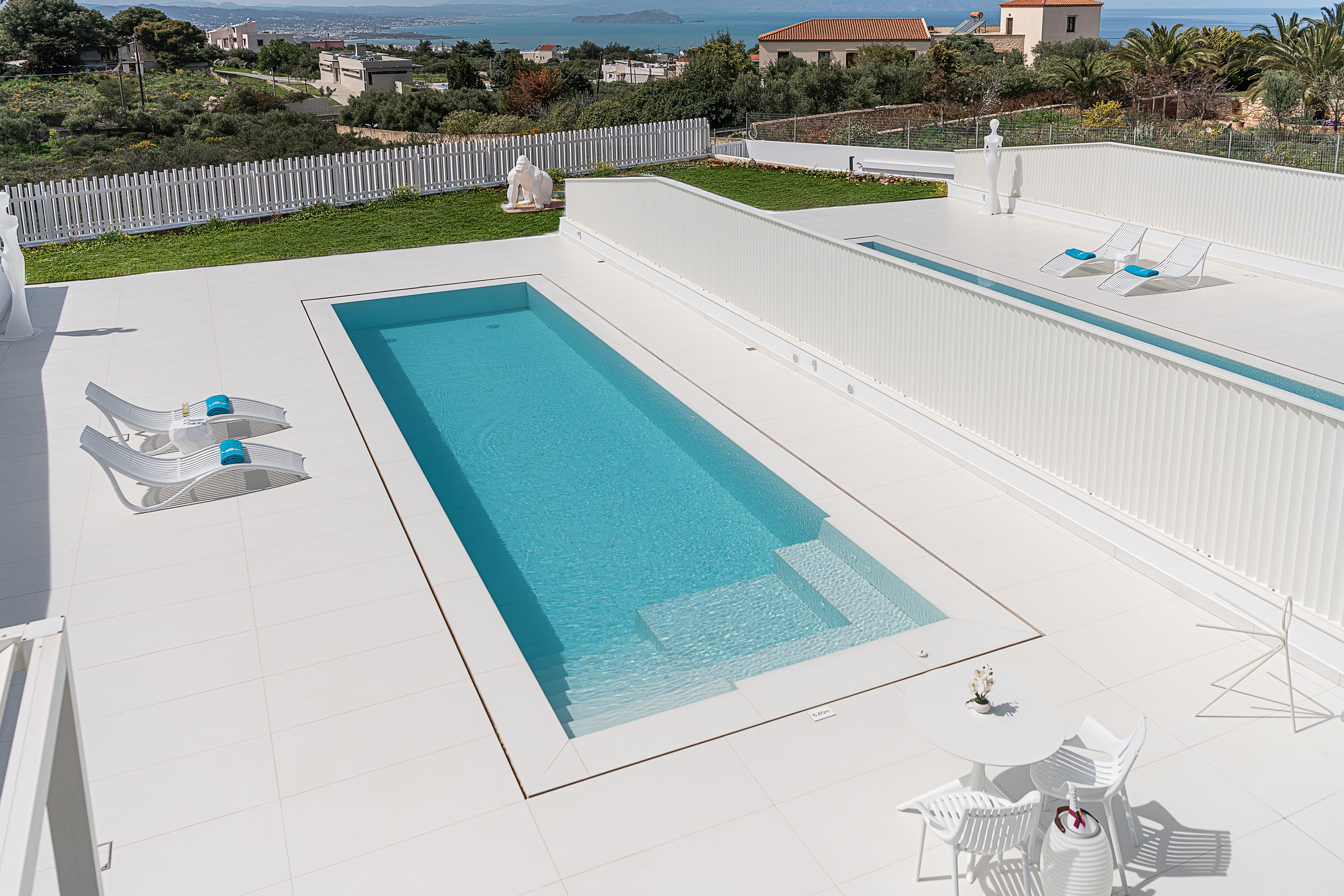 a swimming pool with a fence around it