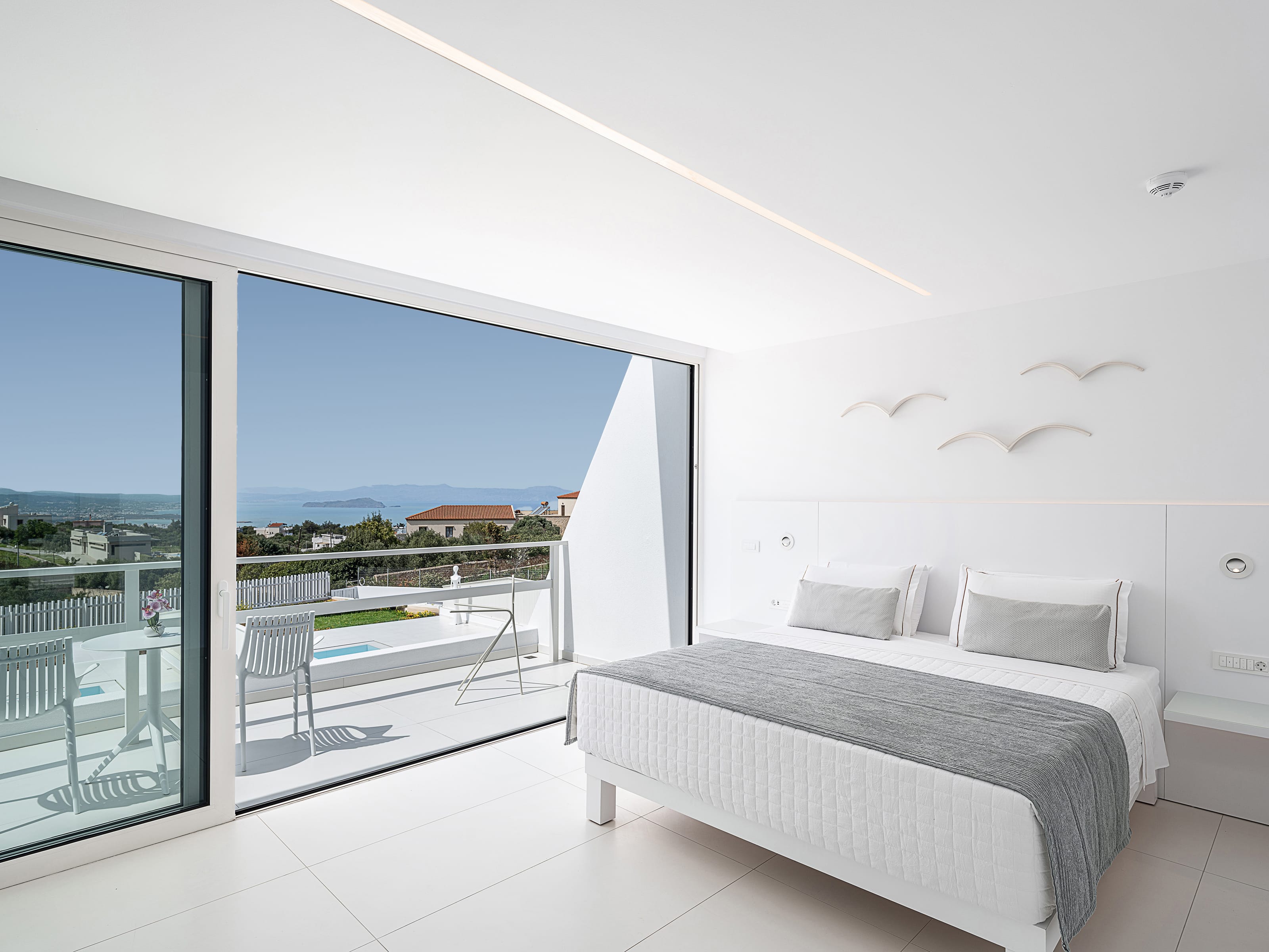 a room with a bed and a window
