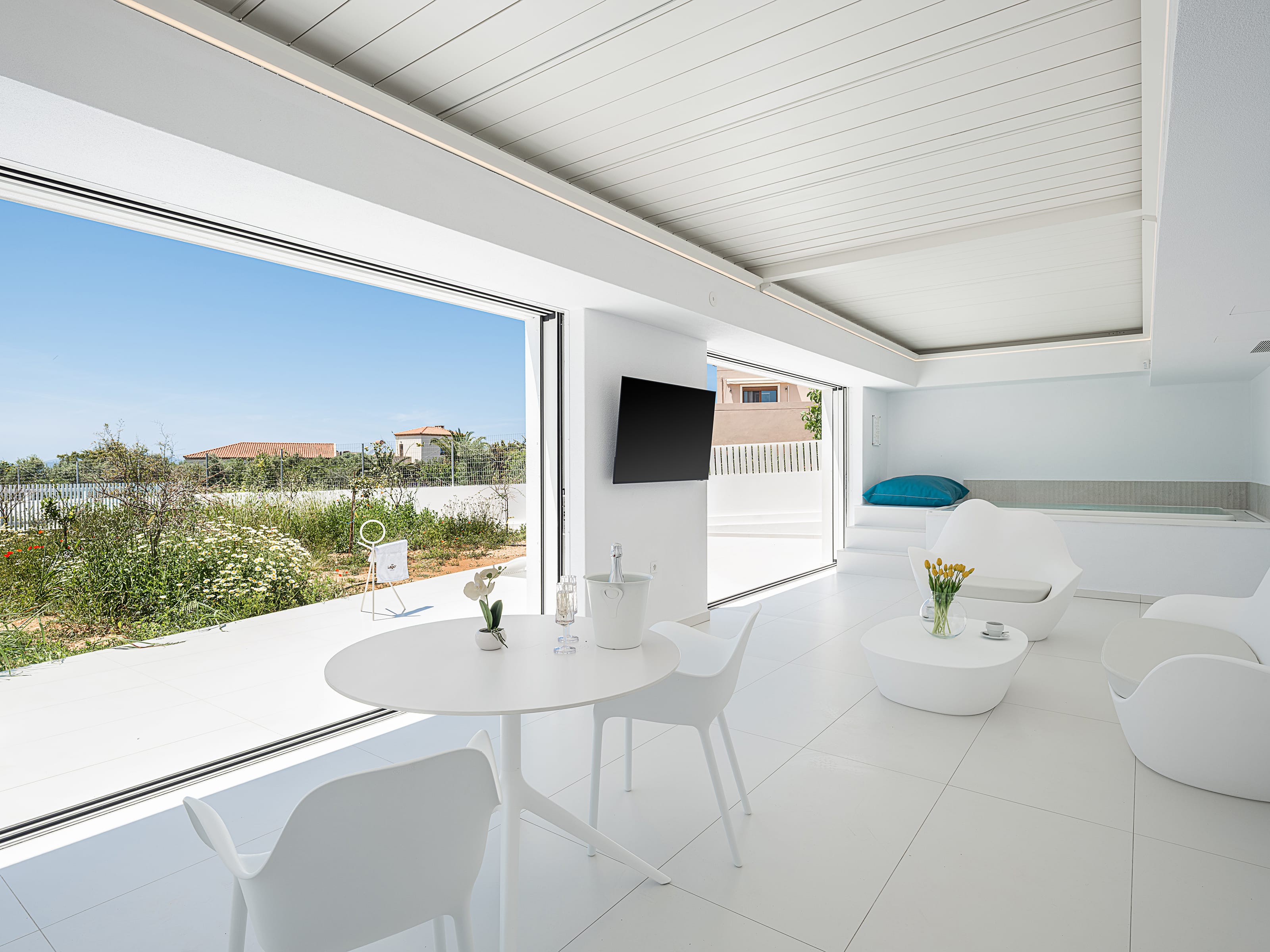 a white room with a large window