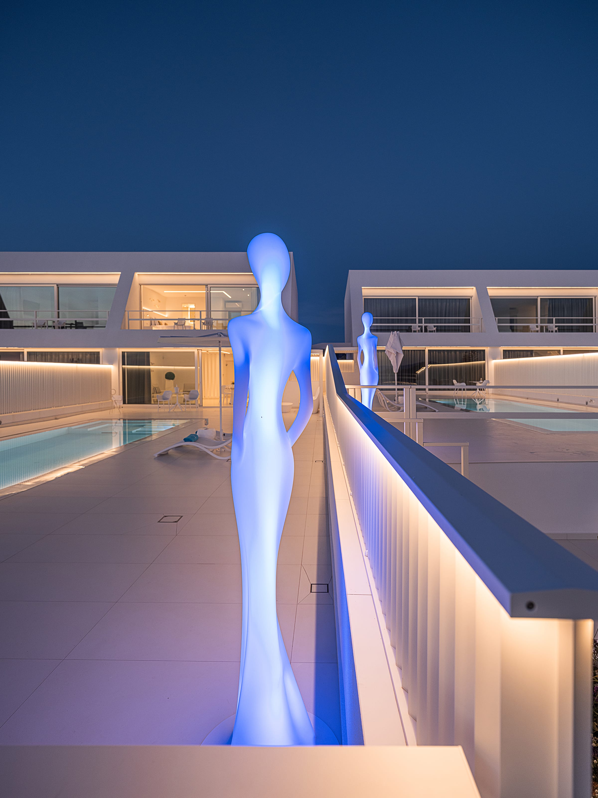 a statue on a balcony