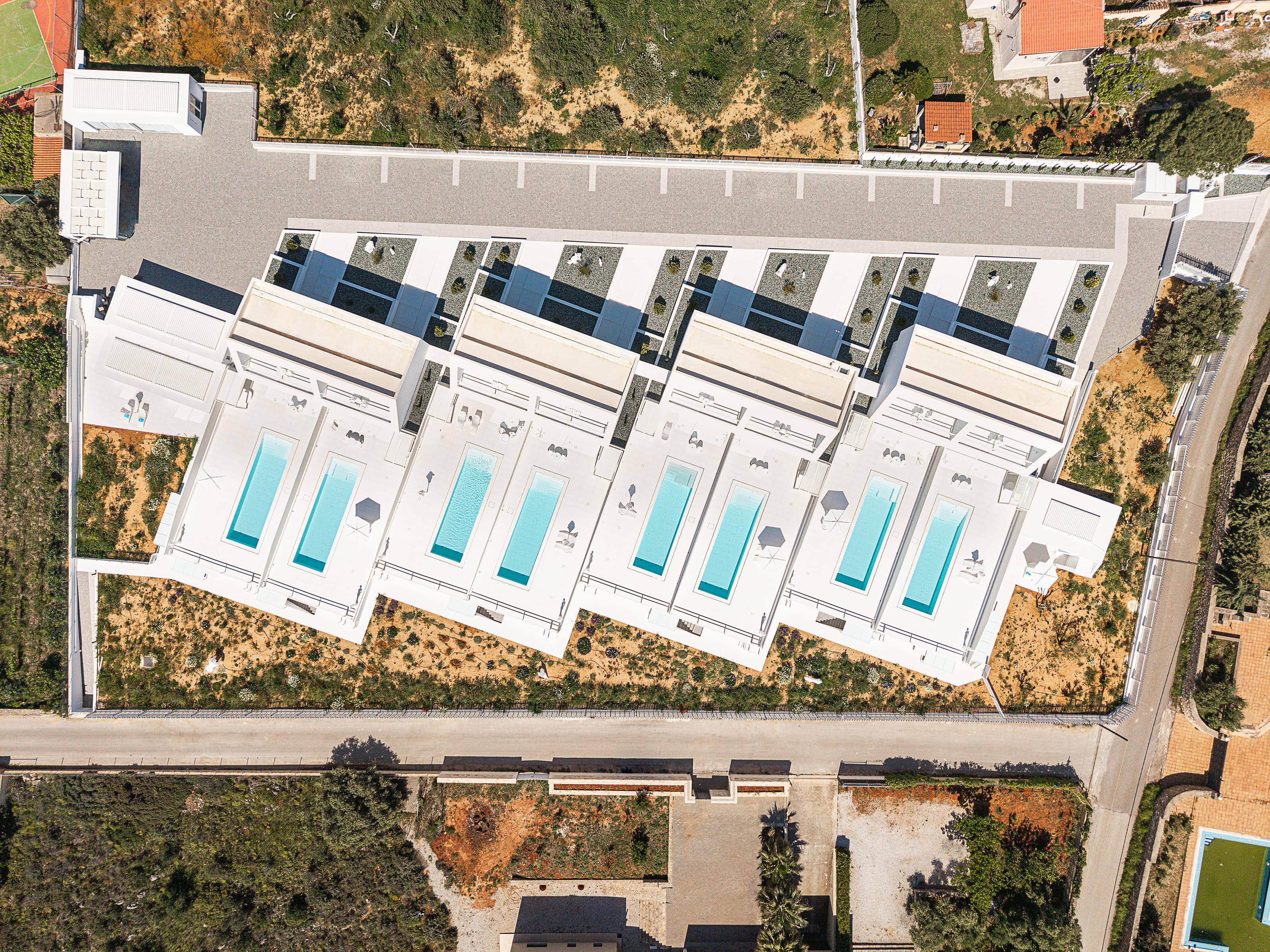 a building with persony pools