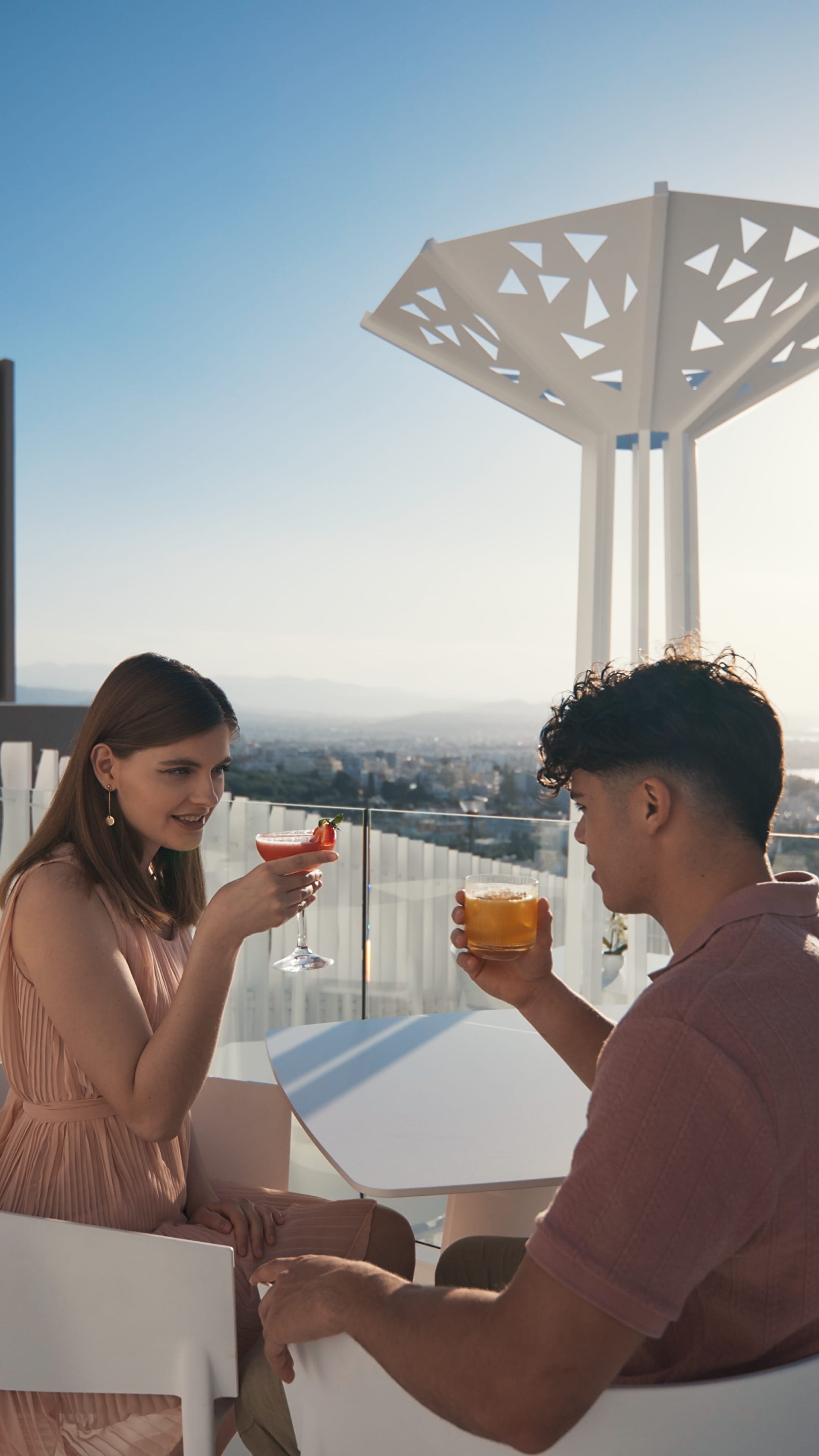 a man and woman drinking wine
