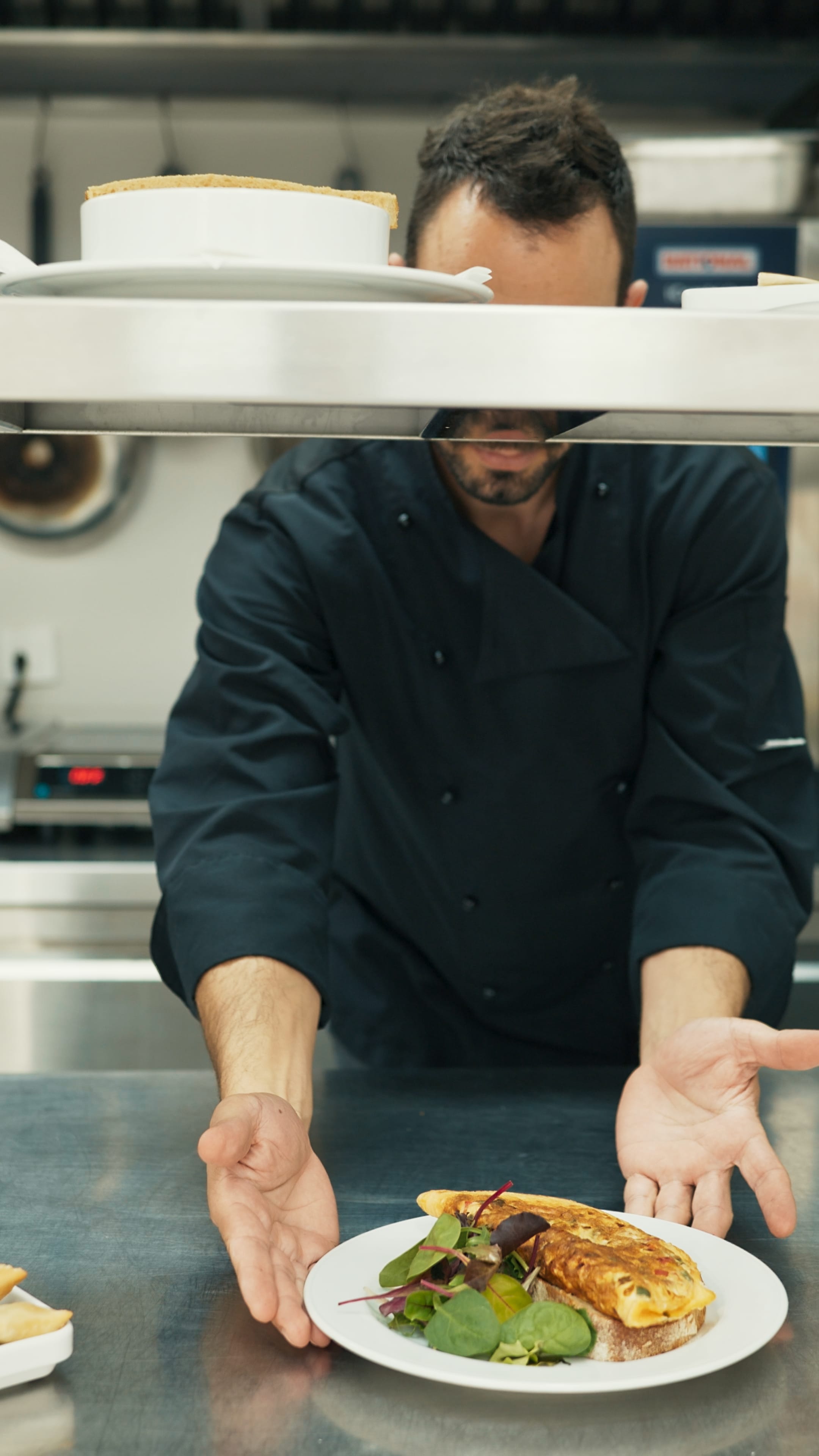 a man holding a plate of food