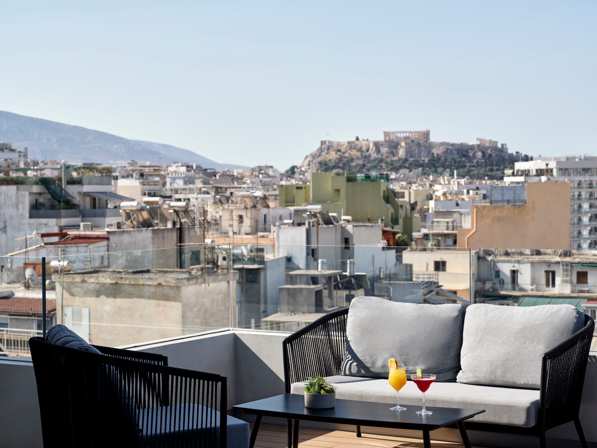 a balcony overlooking a city