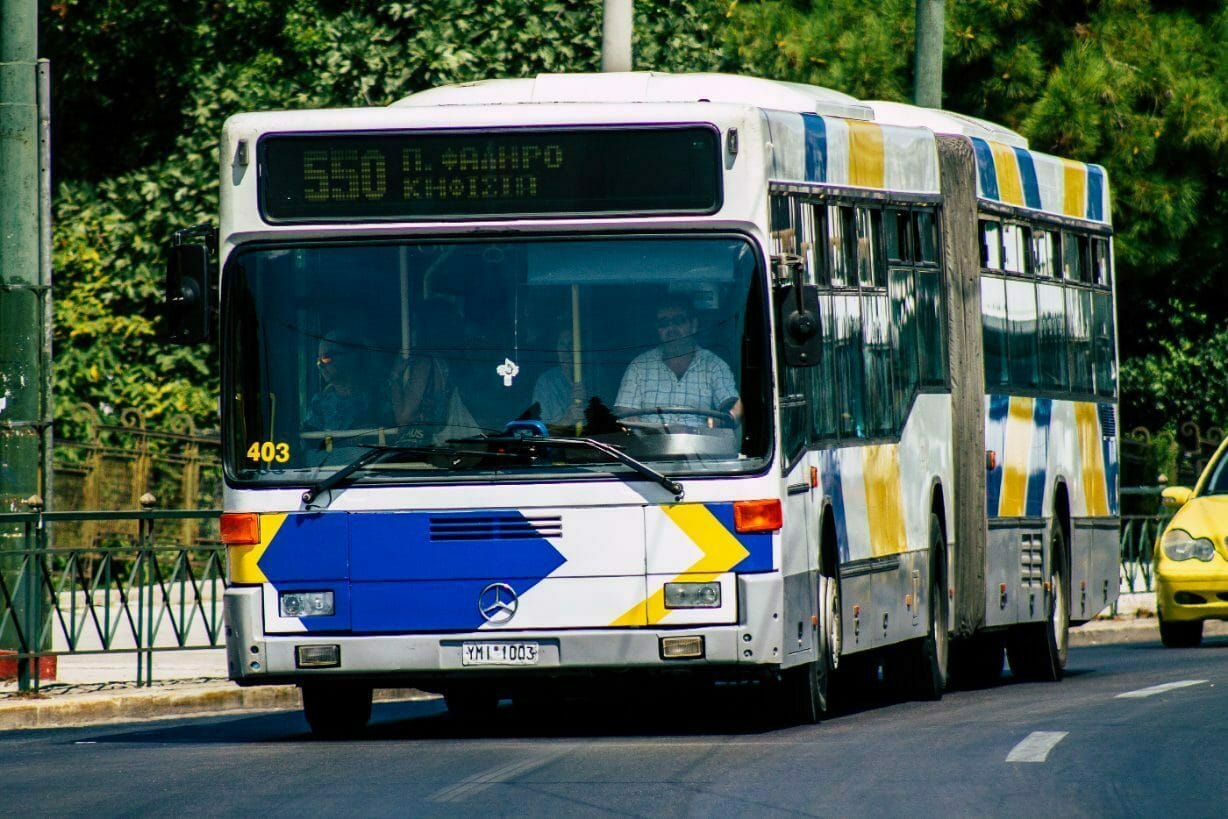 a bus driving down the street